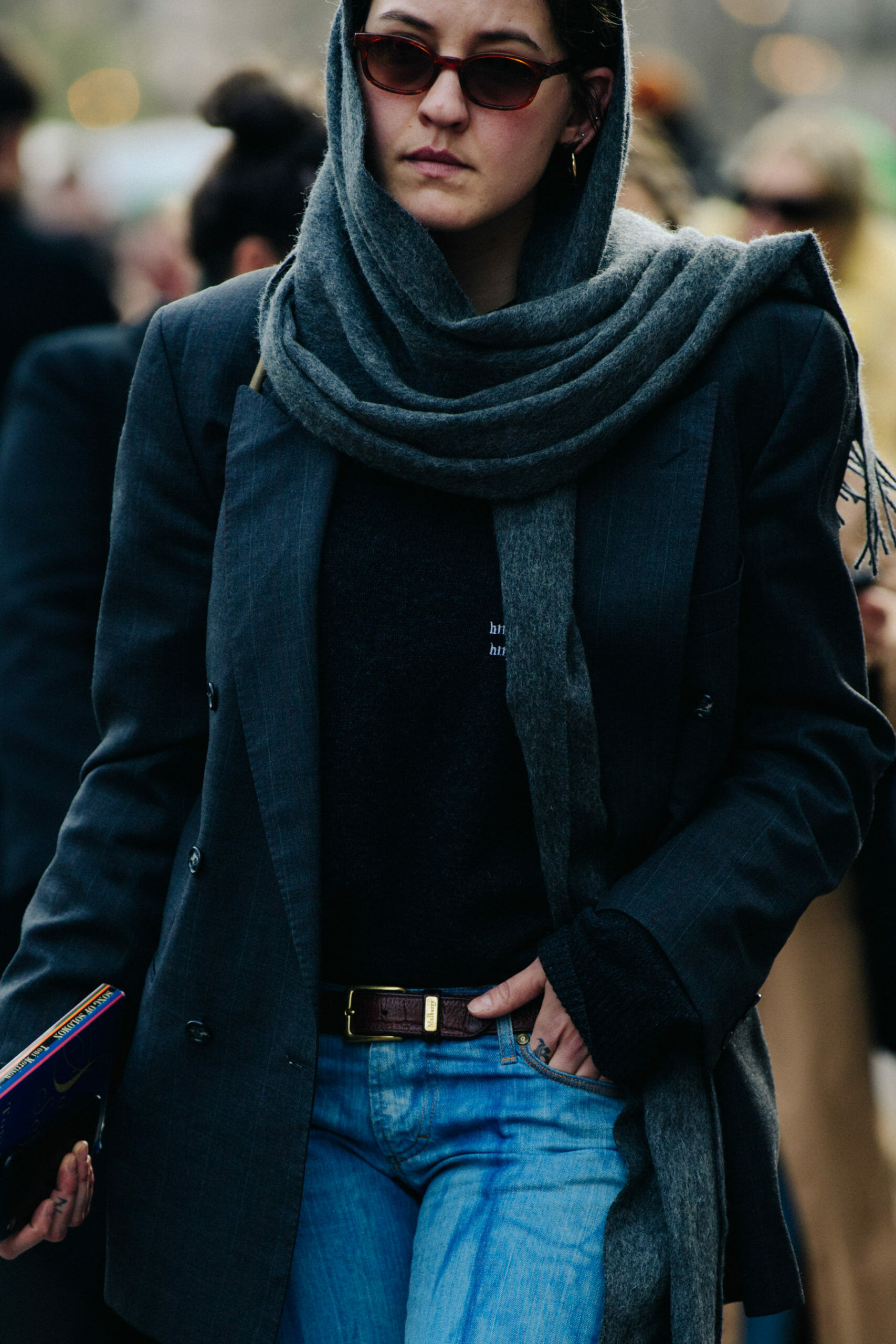 Woman wearing grey scarf