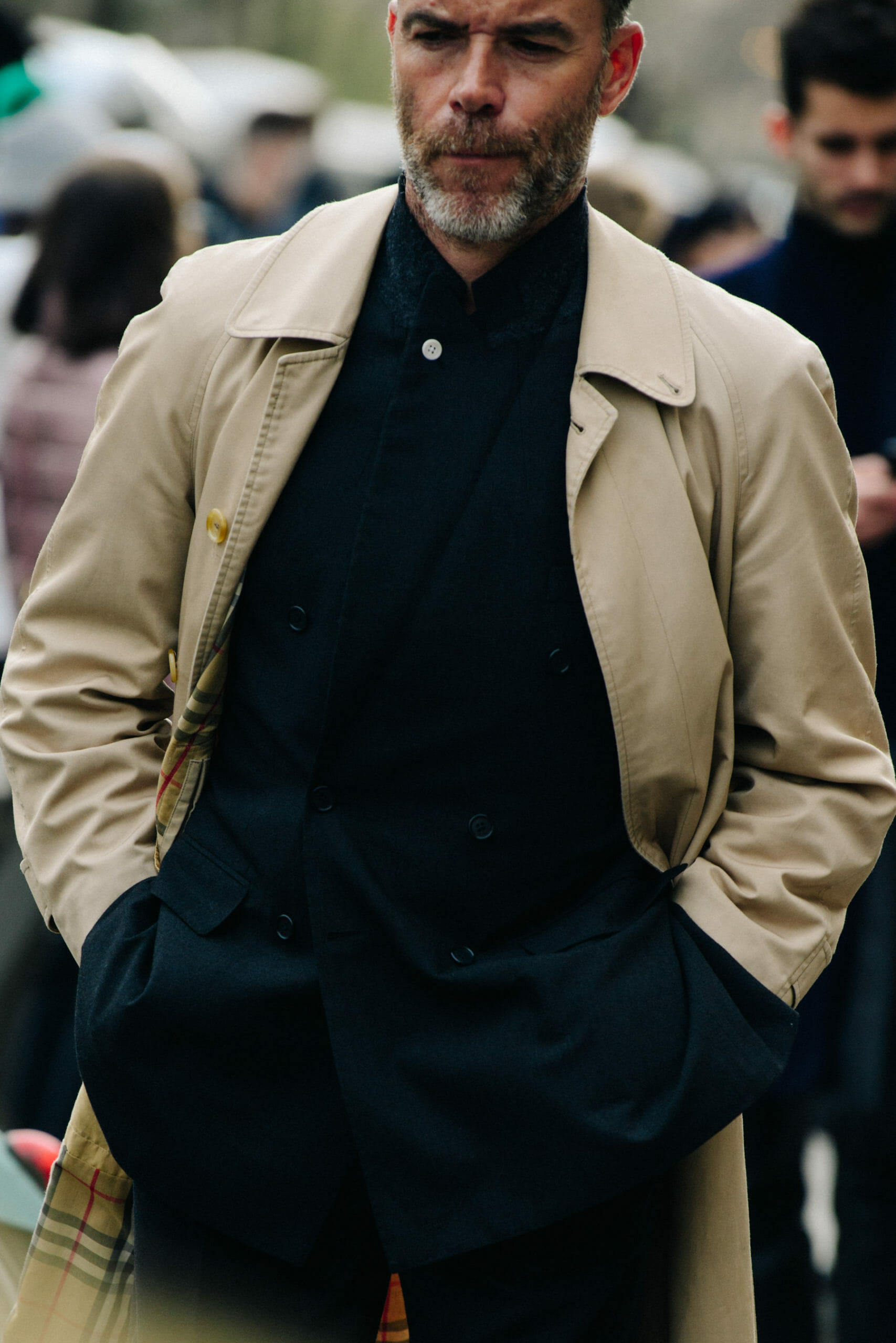 Man wearing tan coat