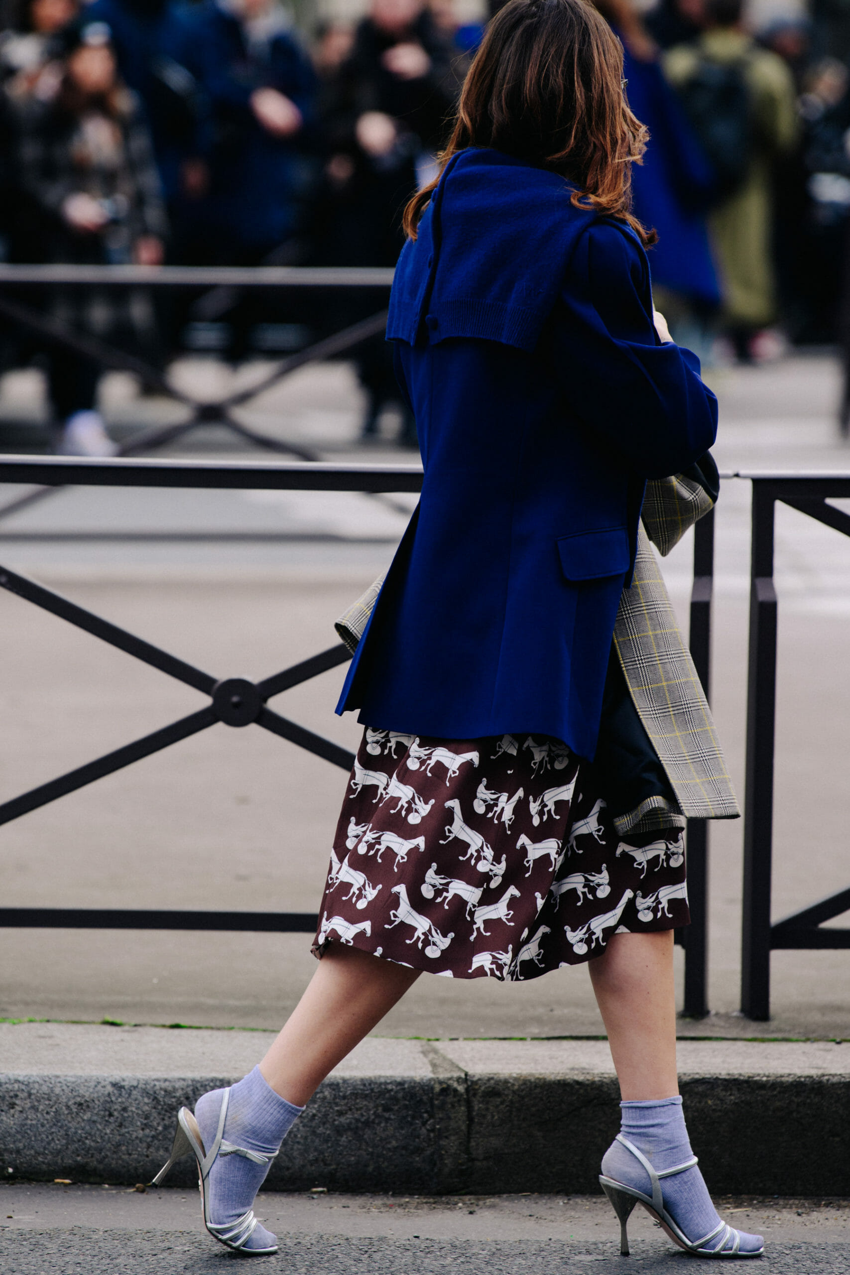 Woman wearing blue coat