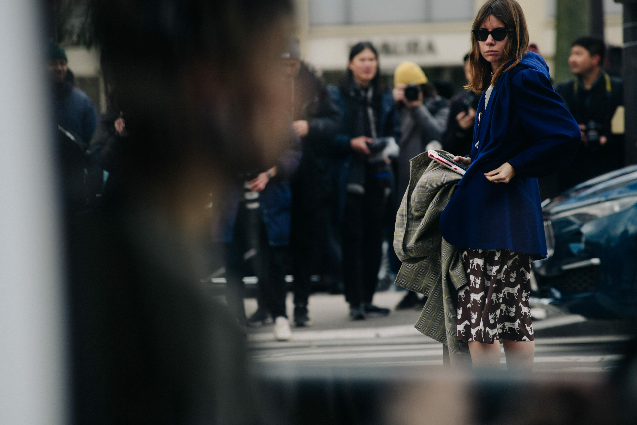 Woman wearing blue coat