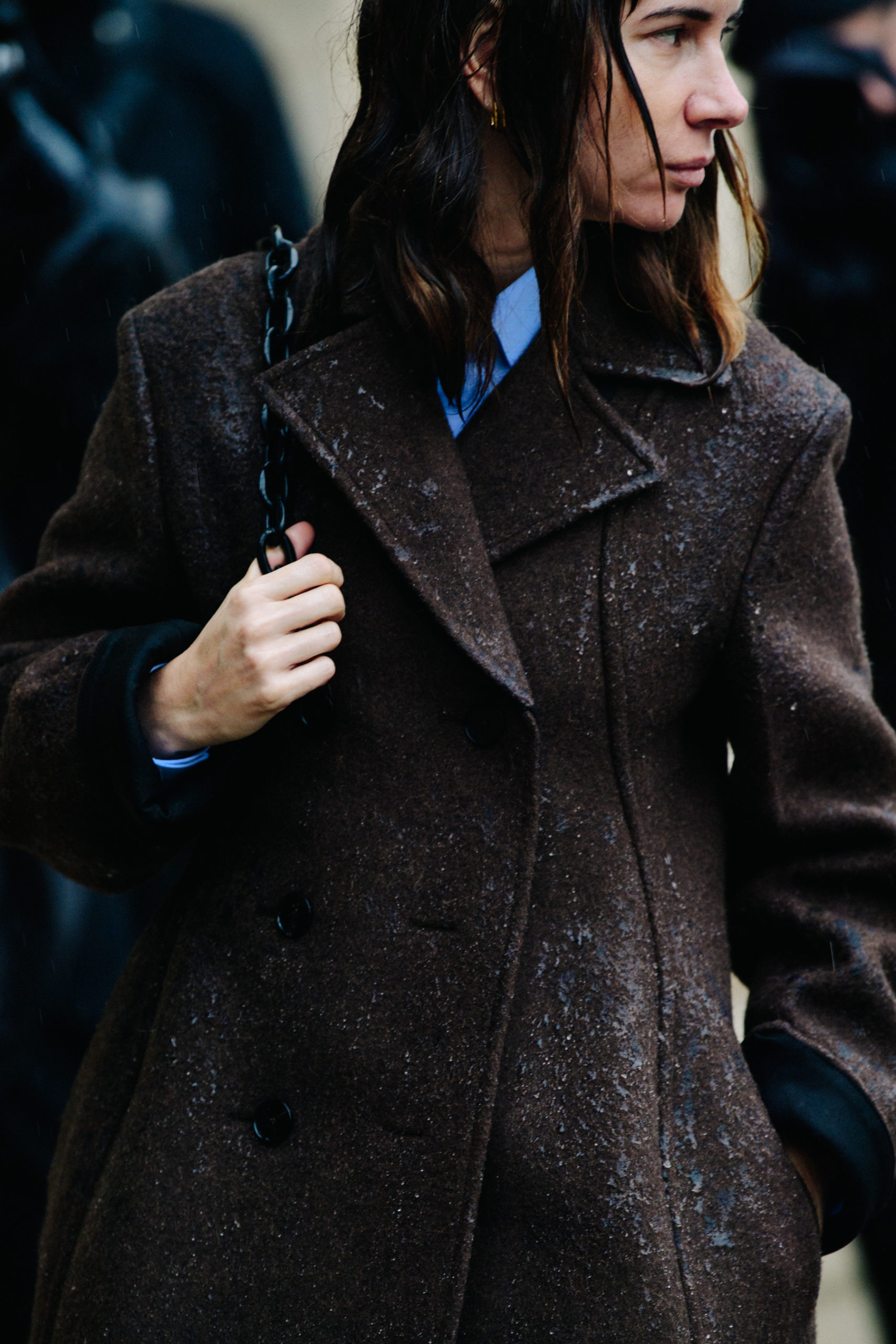 Woman wearing brown coat