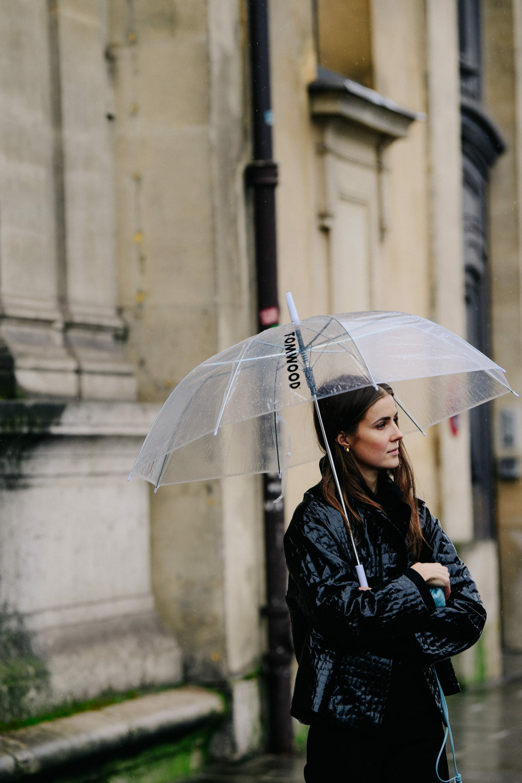 Woman carrying Tom Wood umbrella