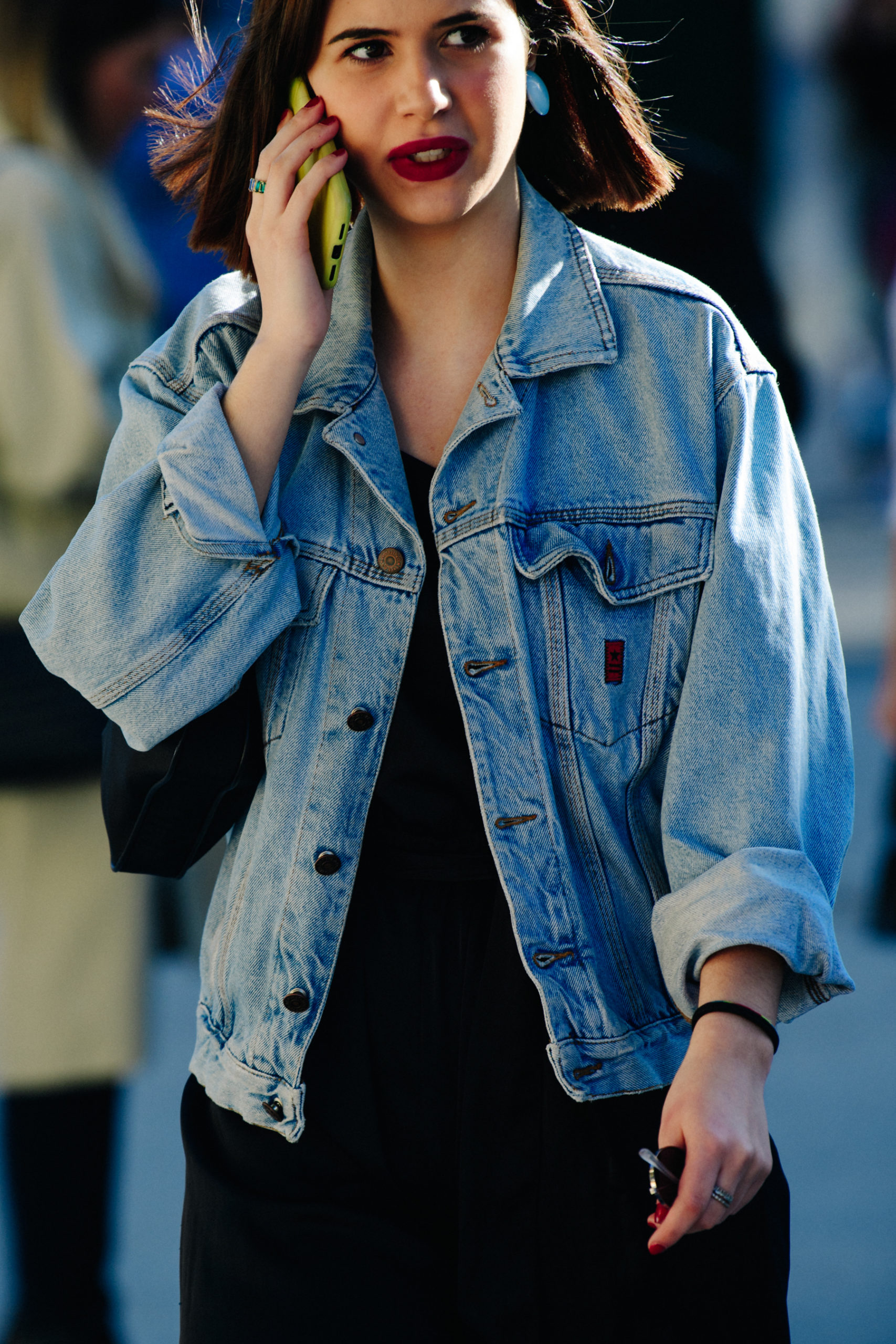 Woman wearing denim jacket