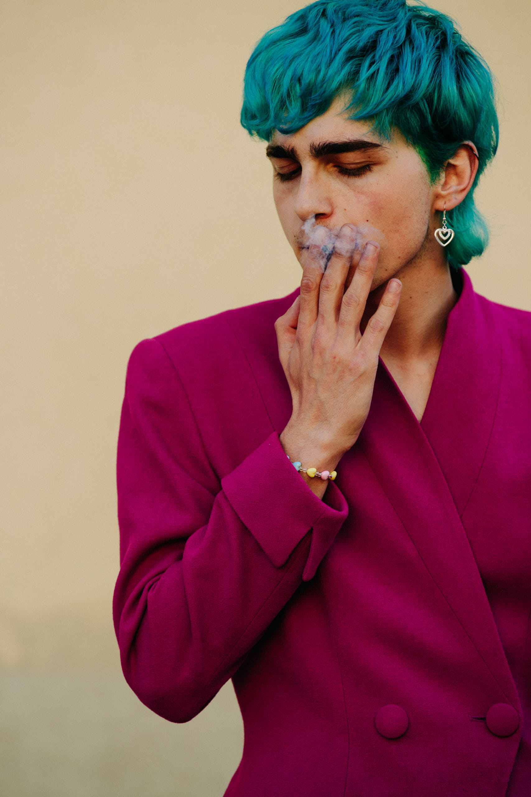 Man wearing pink suit