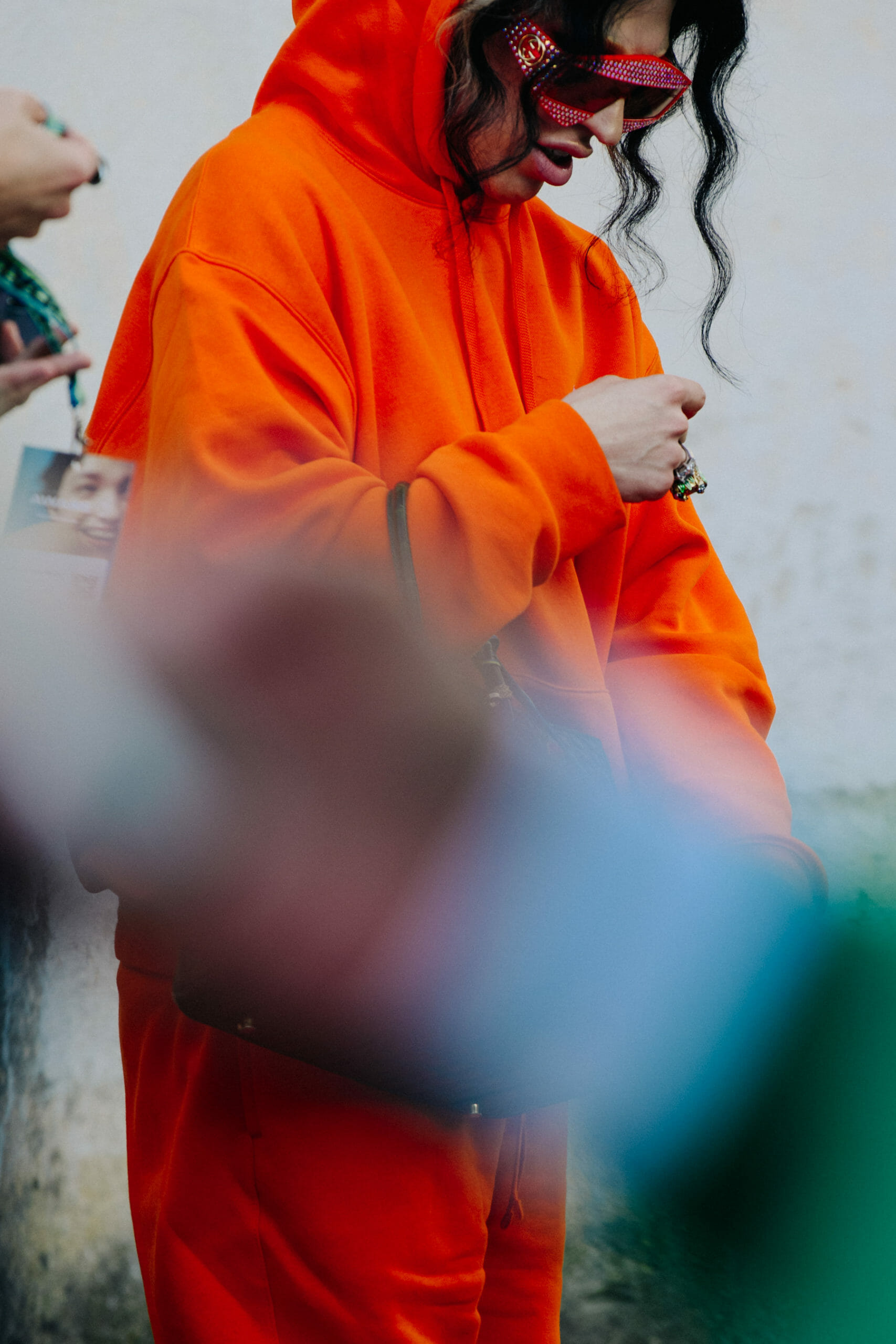 Woman wearing orange jumpsuit
