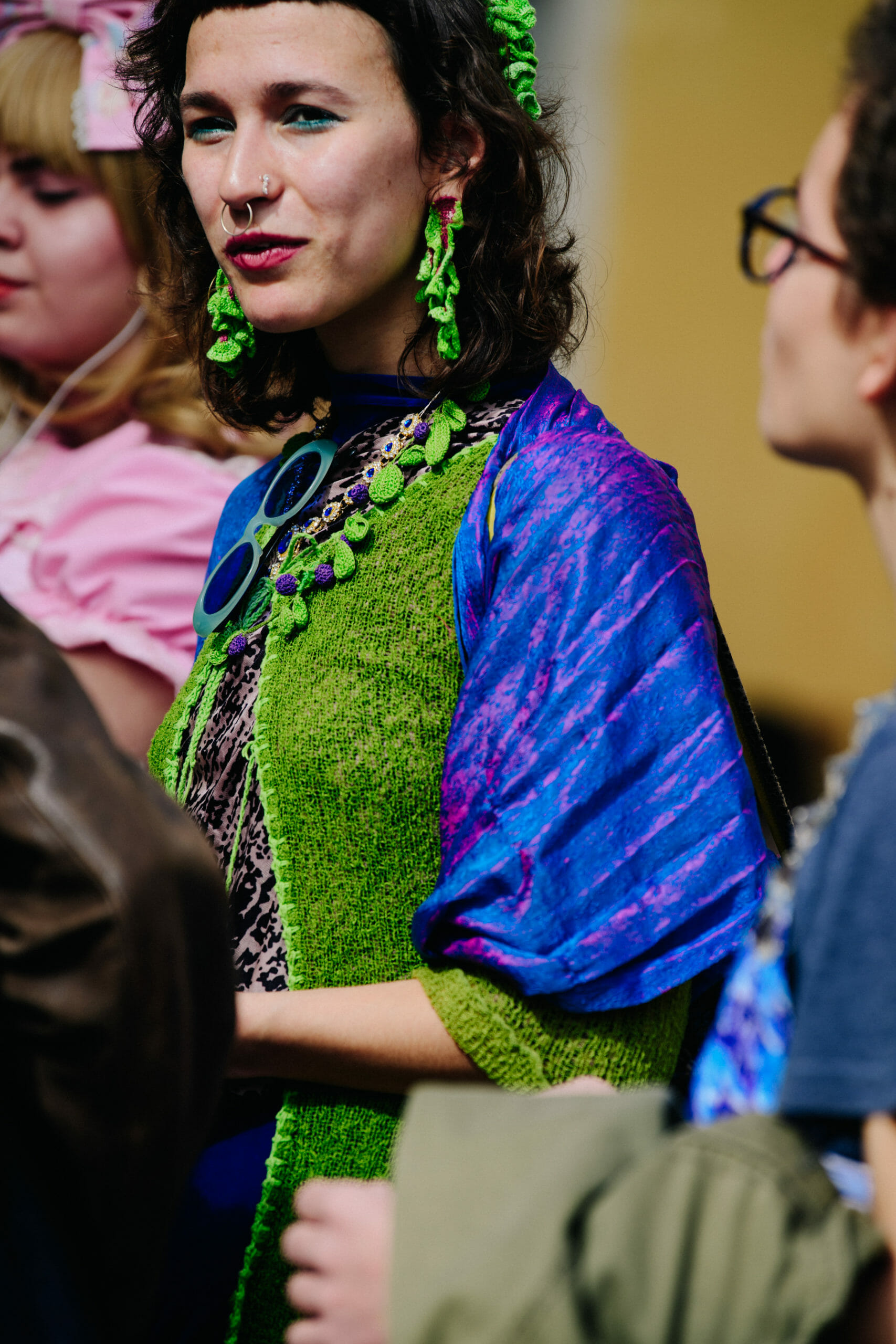 Woman wearing green and blue