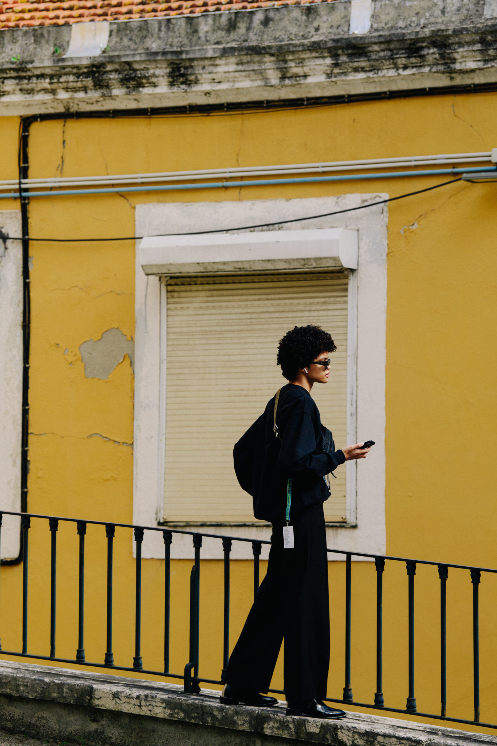 Model wearing black jumpsuit
