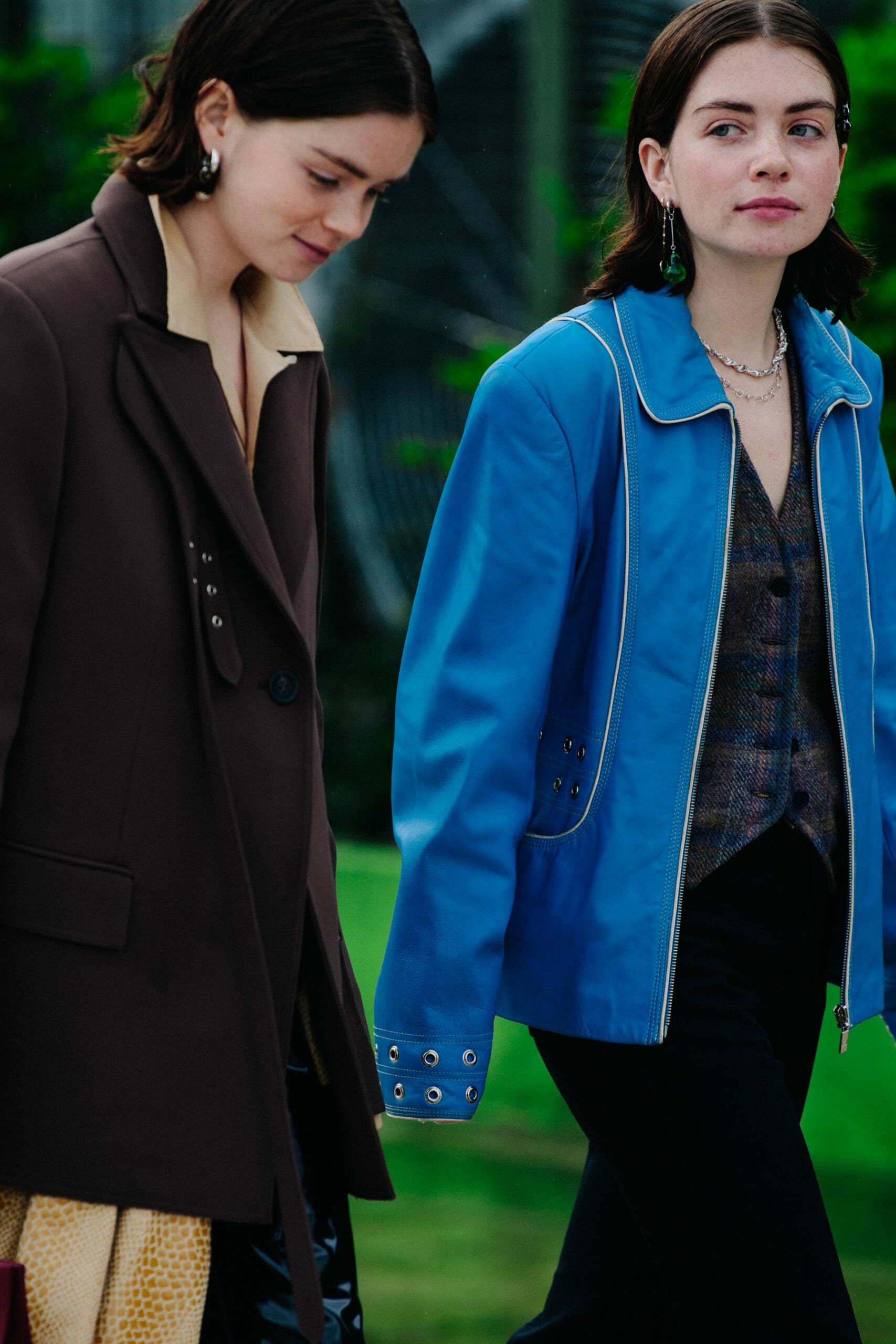 Twins wearing light jackets
