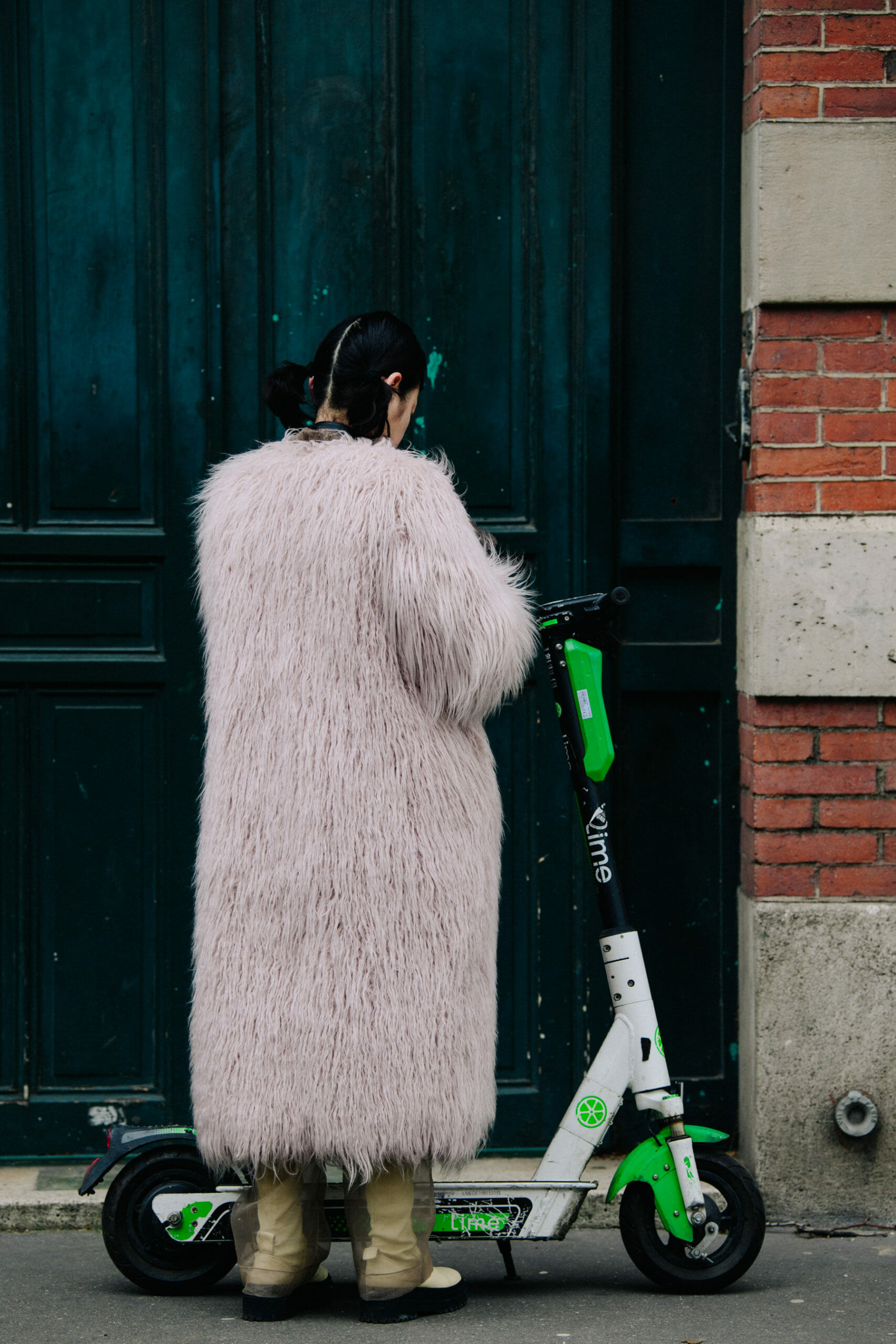 Woman wearing pink coat
