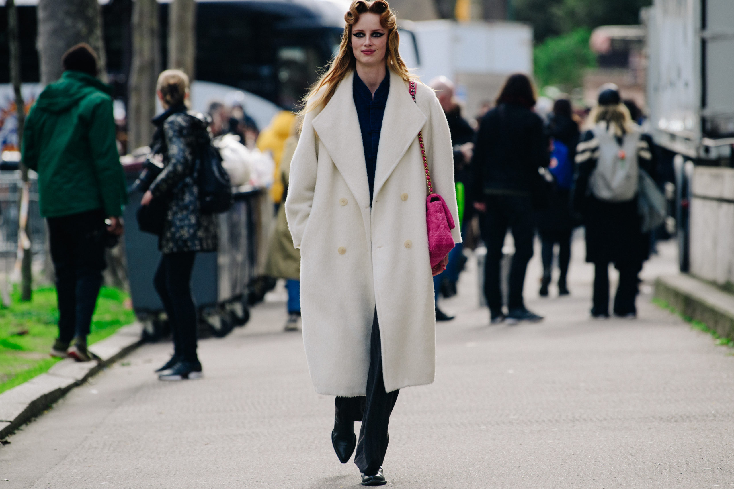 Model wearing white coat