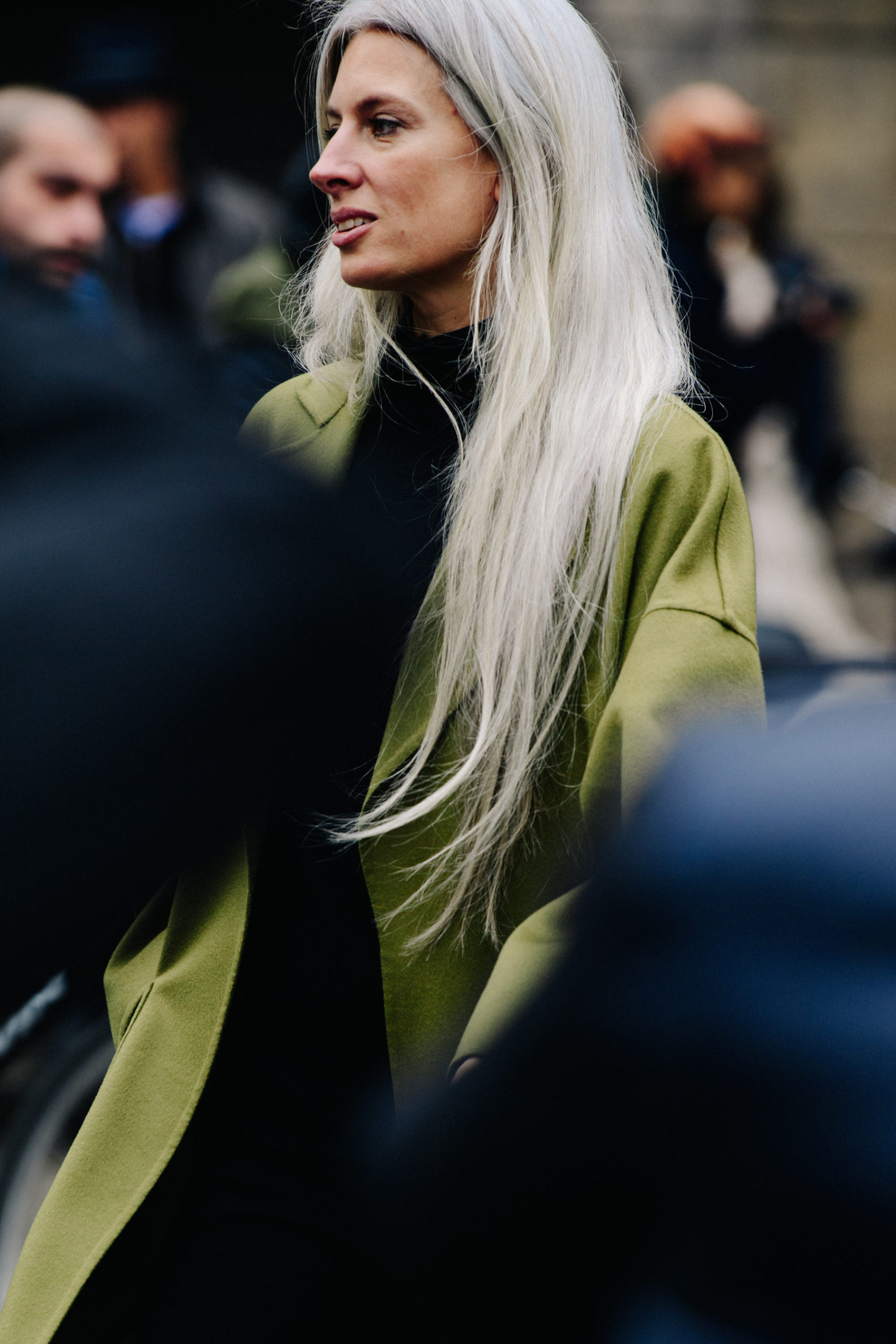 Woman wearing green coat