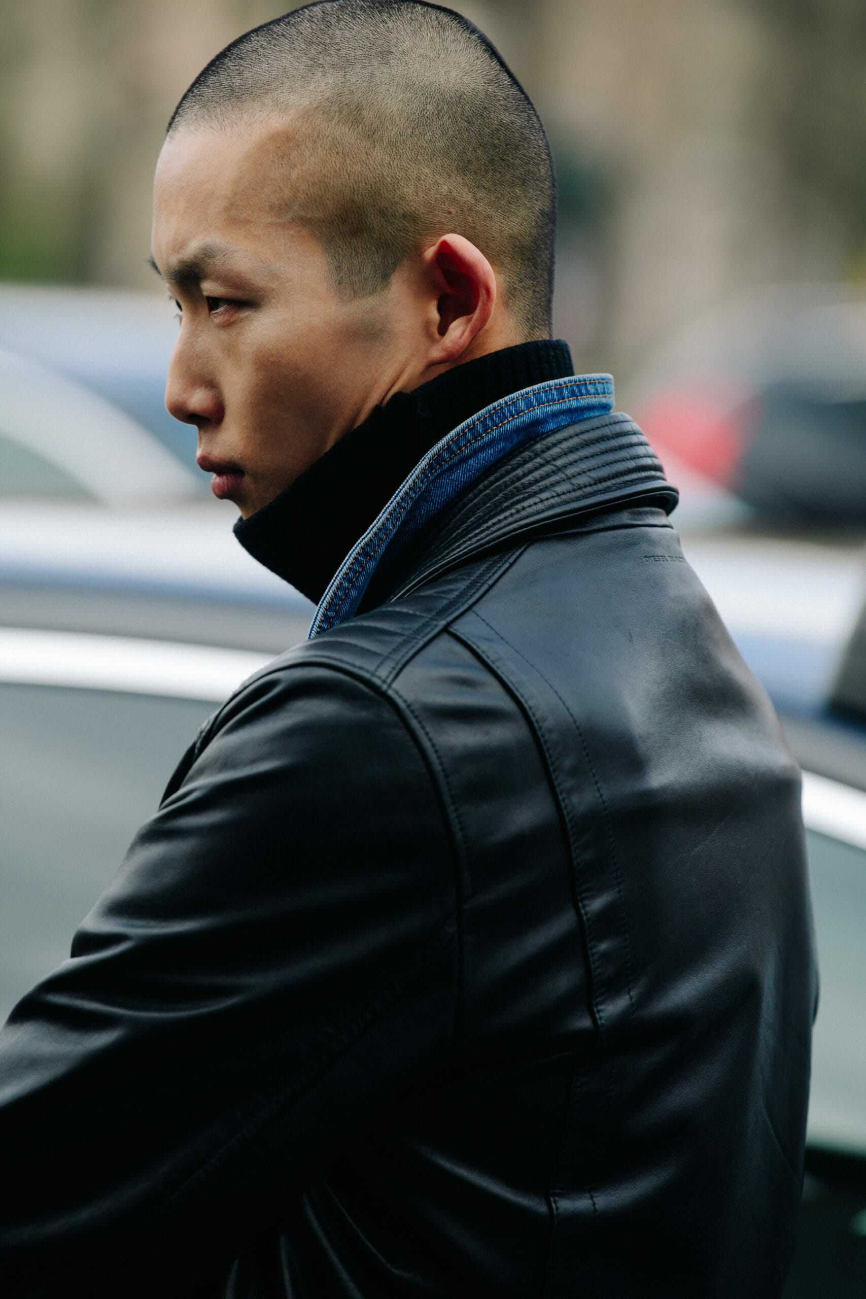 Model wearing leather jacket