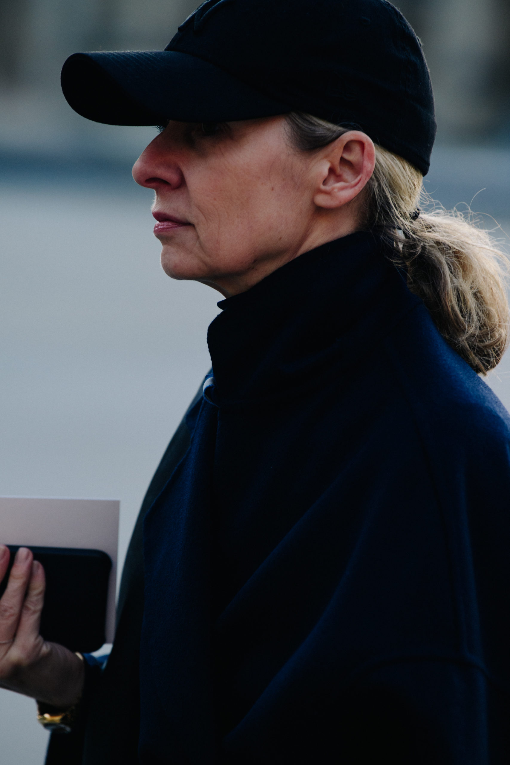 Woman wearing black cap