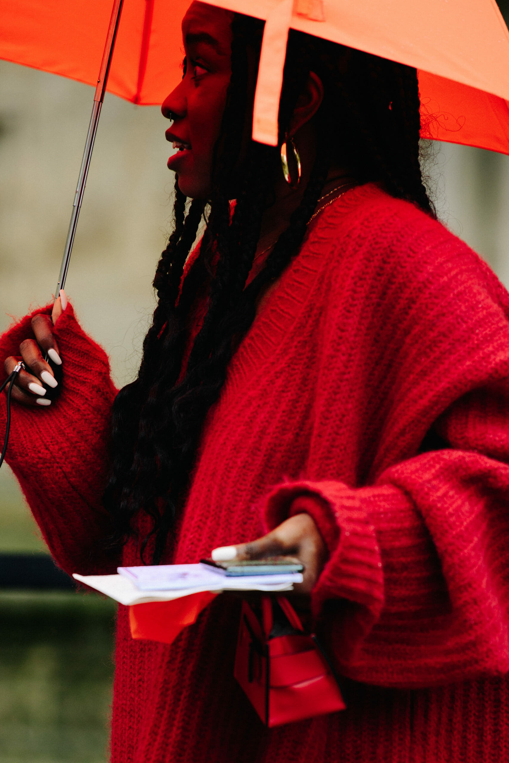 Woman wearing red jumper
