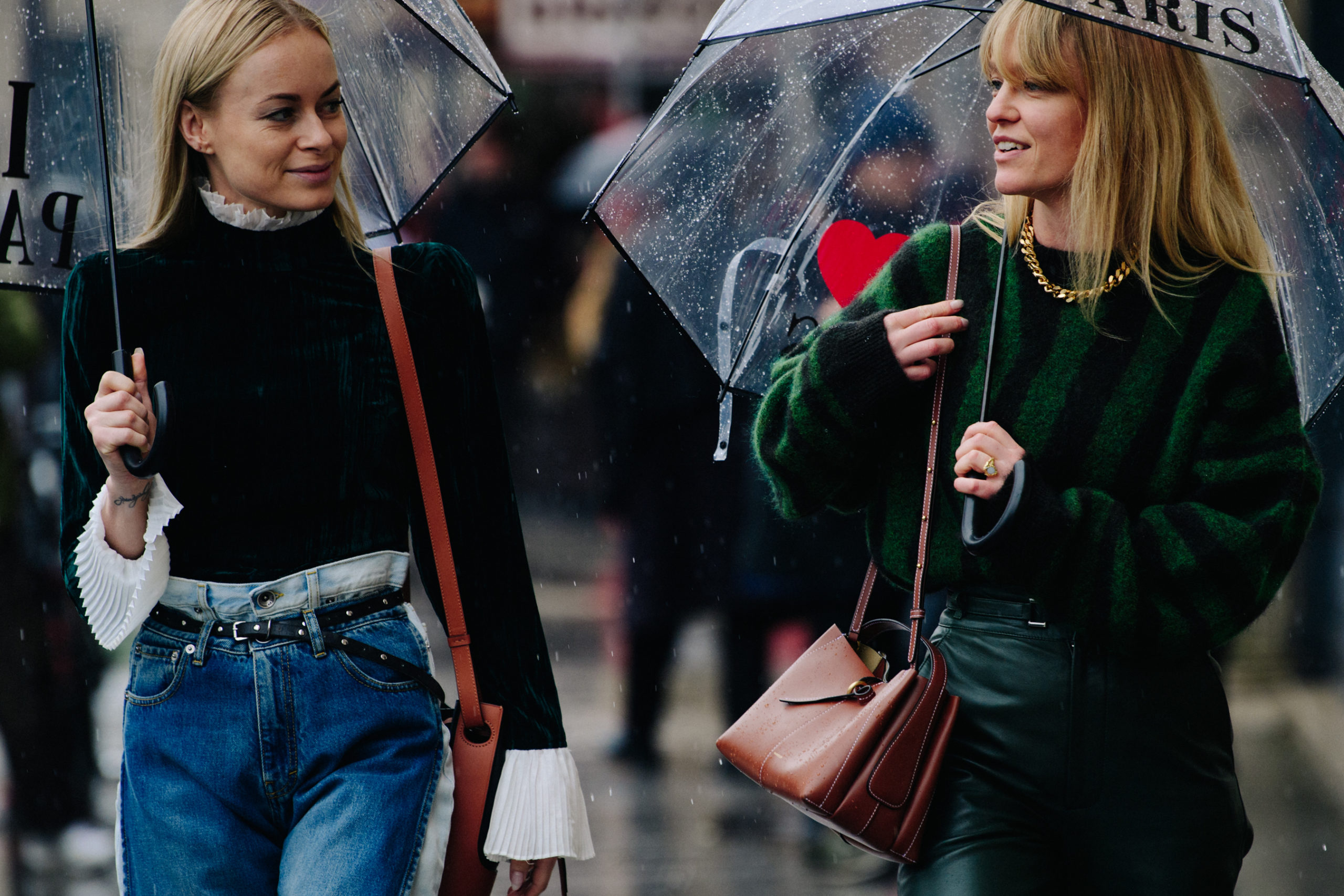 Women carrying umbrellas