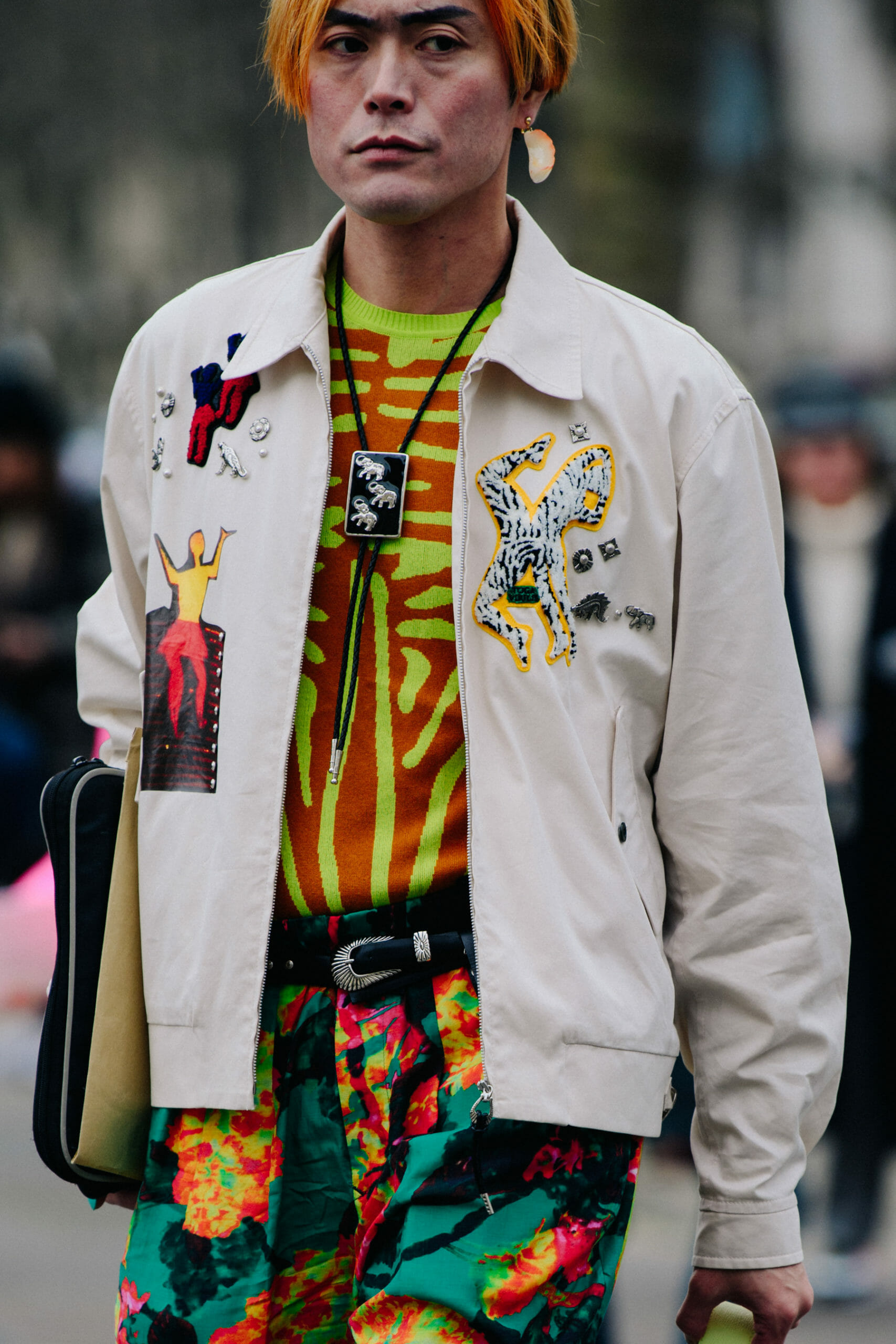 Japanese man wearing white jacket