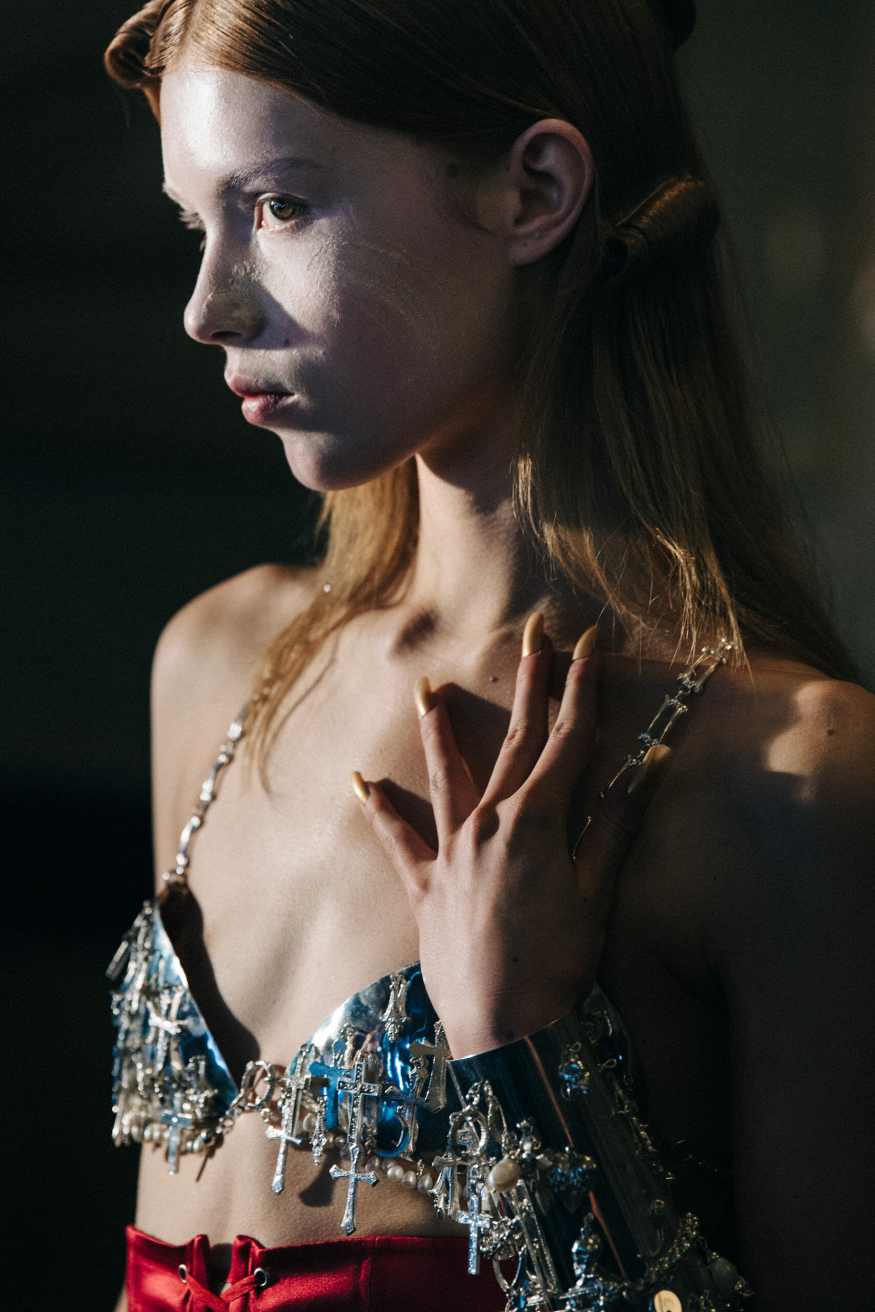 Model wearing silver dress