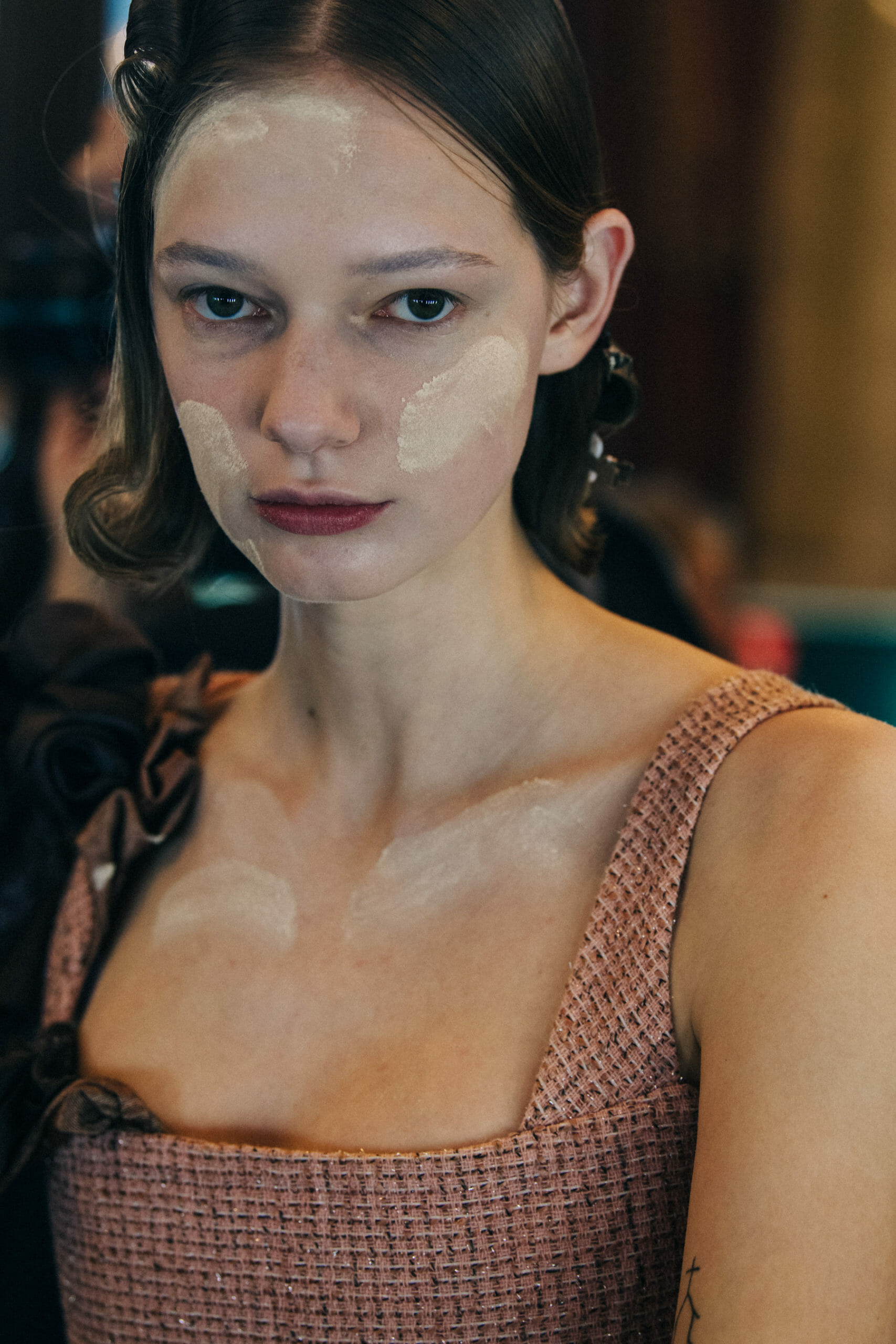 Model wearing check dress