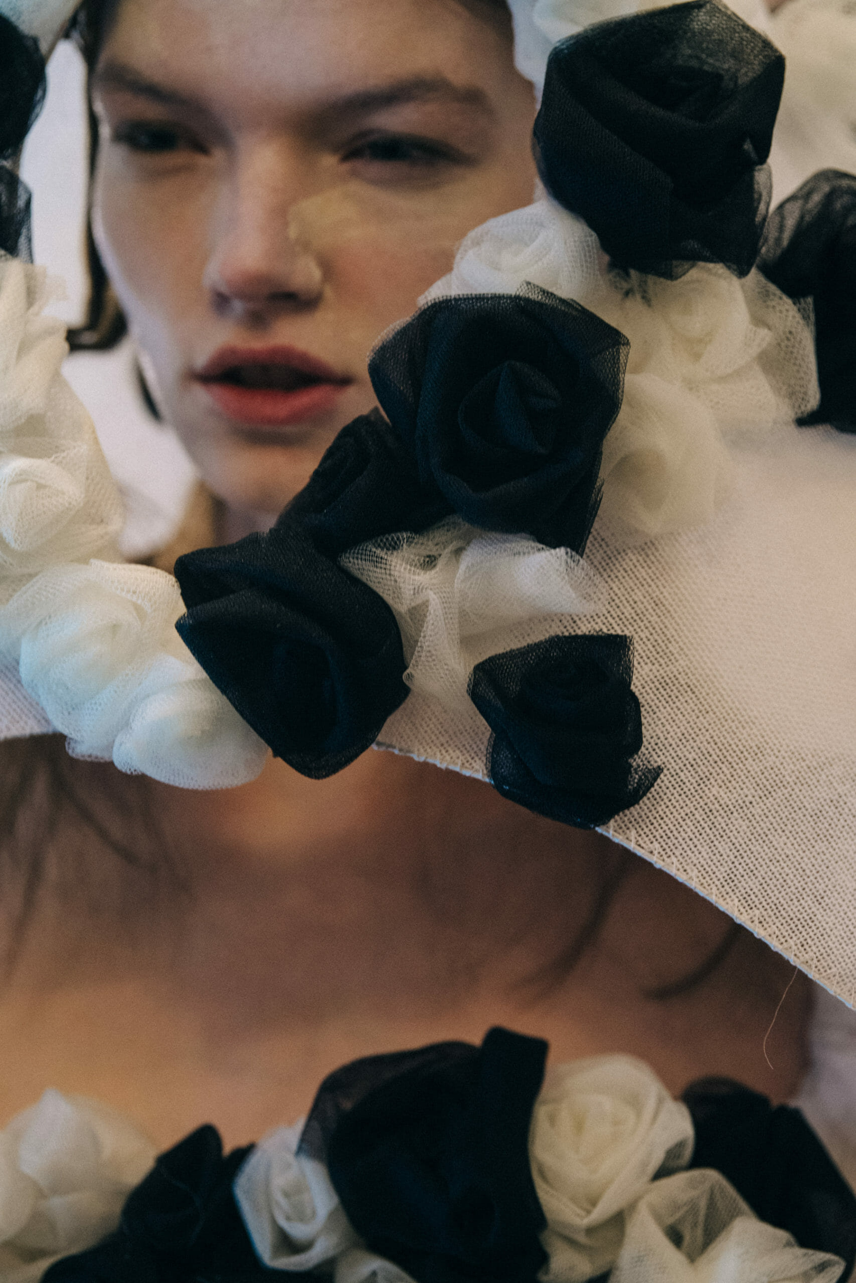 Model wearing white dress