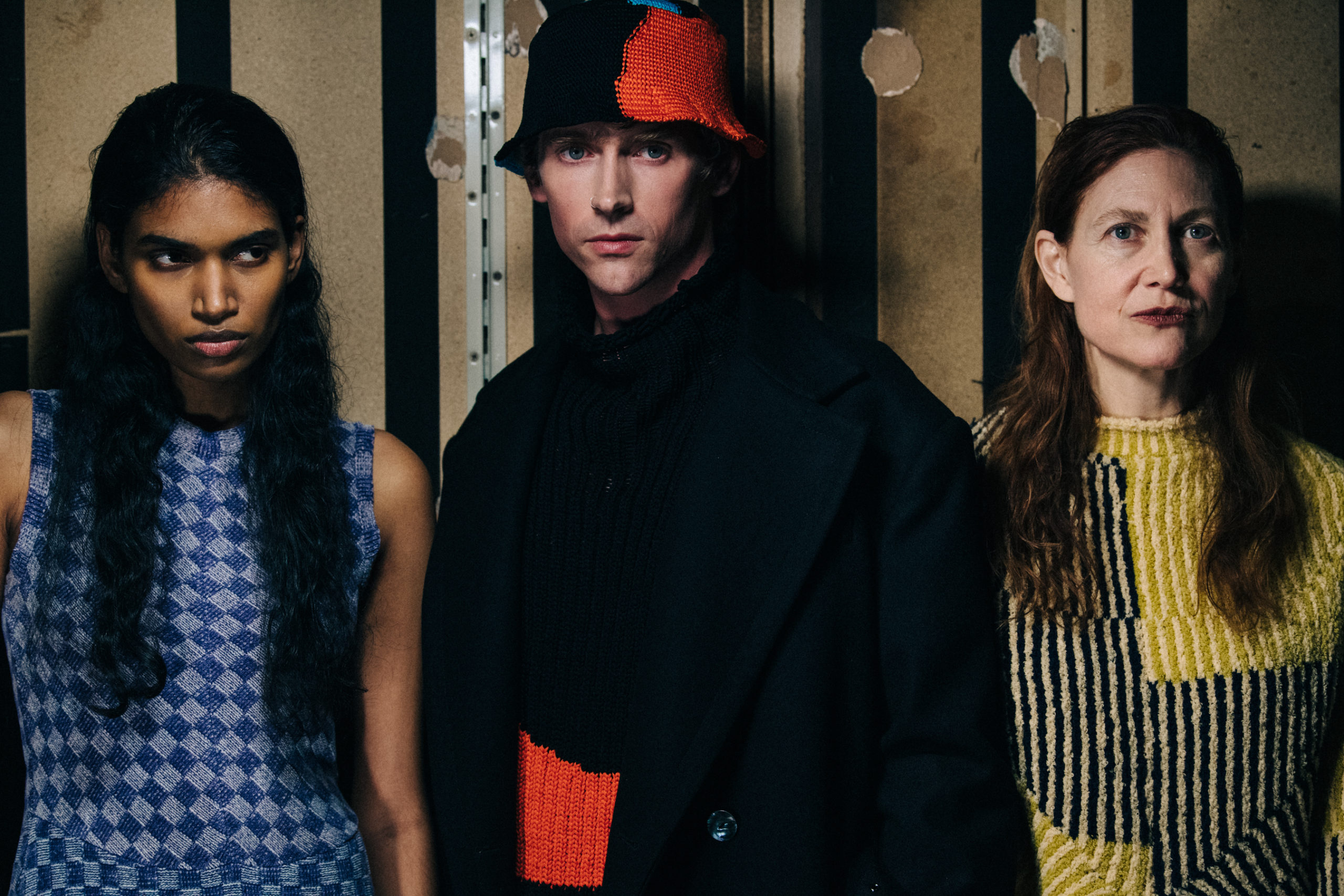 Models wearing colourful outfits