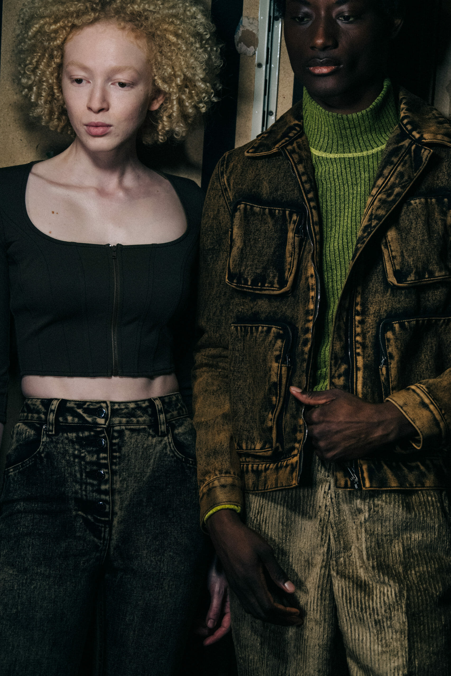 Models wearing dark outfits
