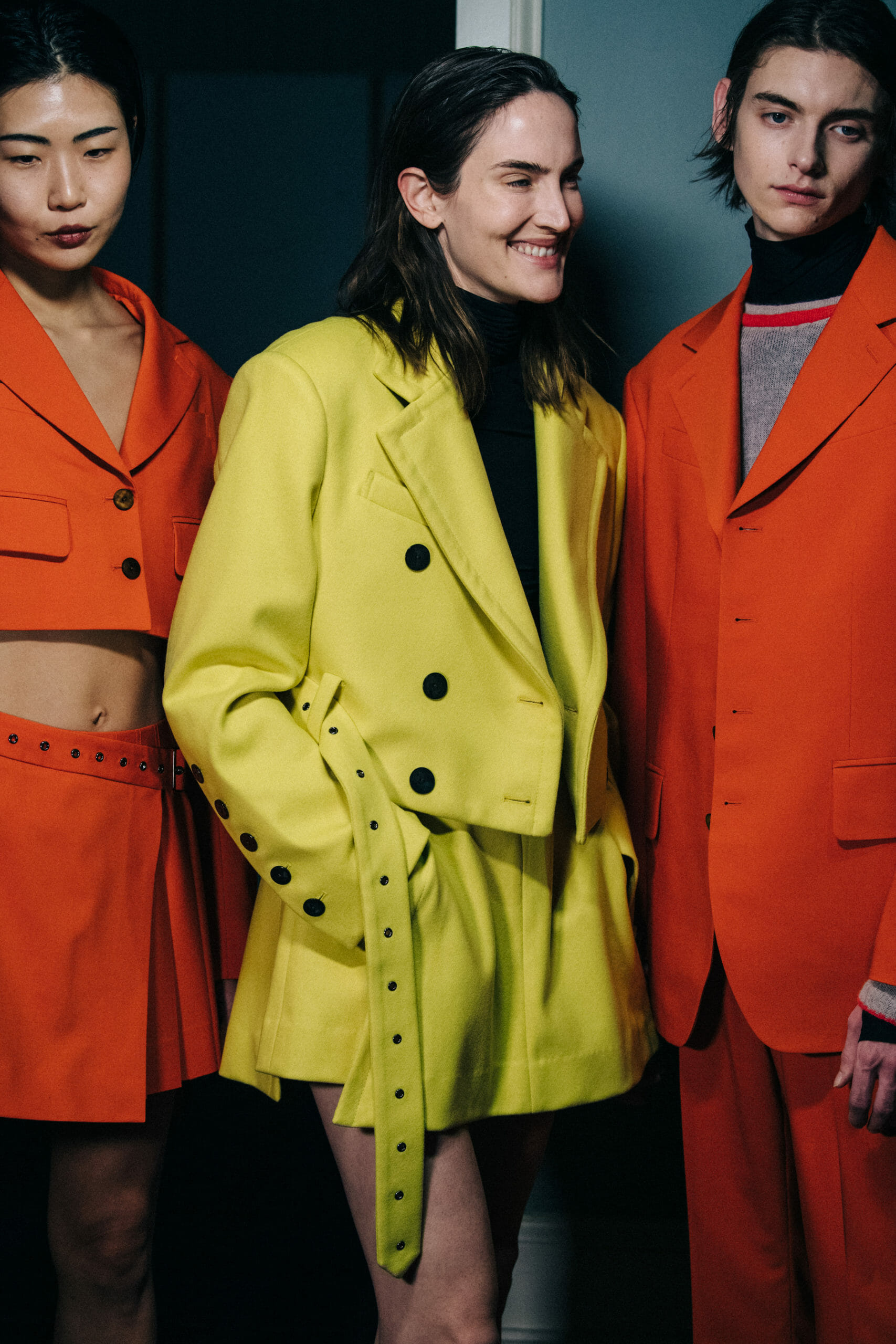 Models wearing colourful outfits