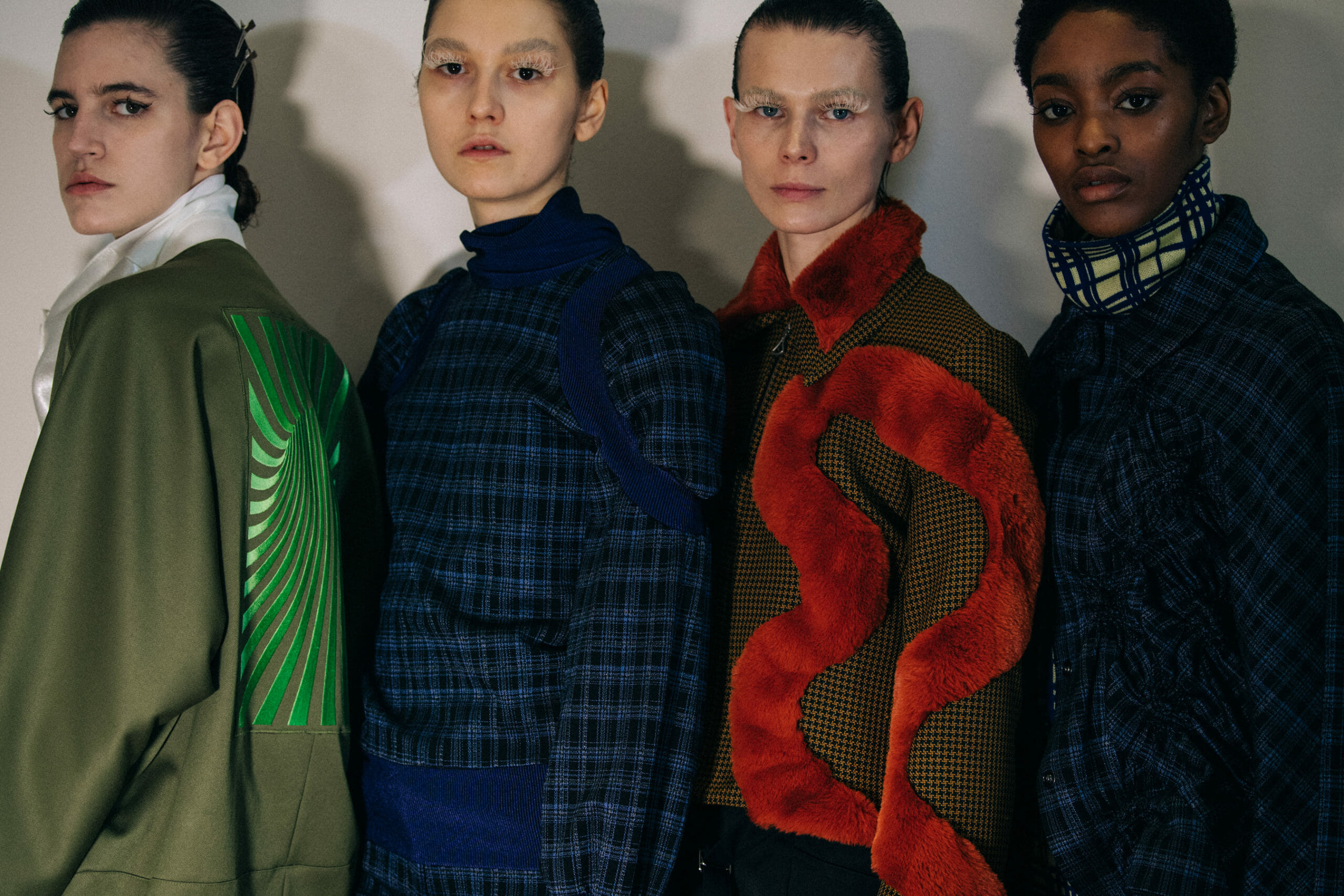Models wearing furry jackets