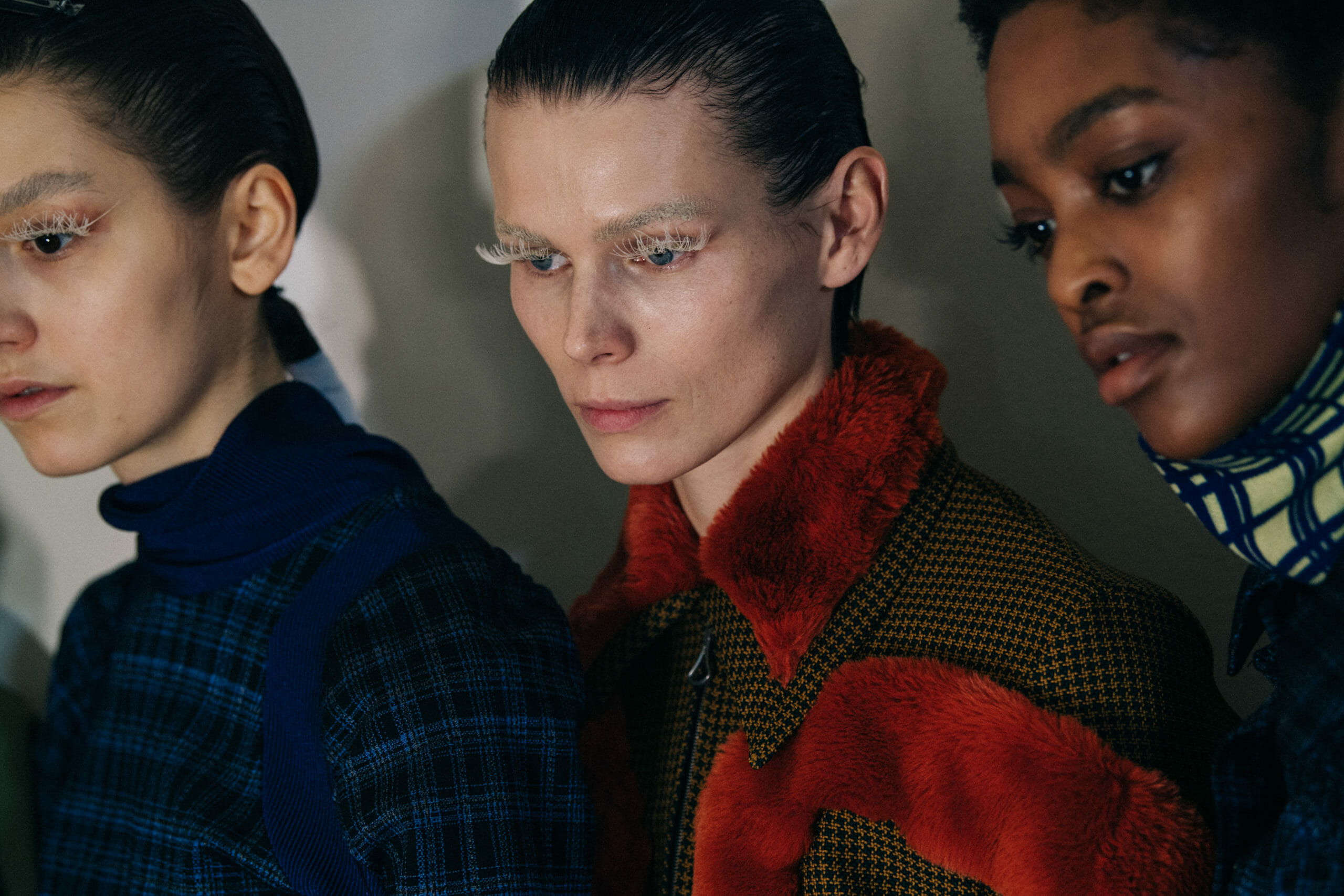 Models wearing furry jackets