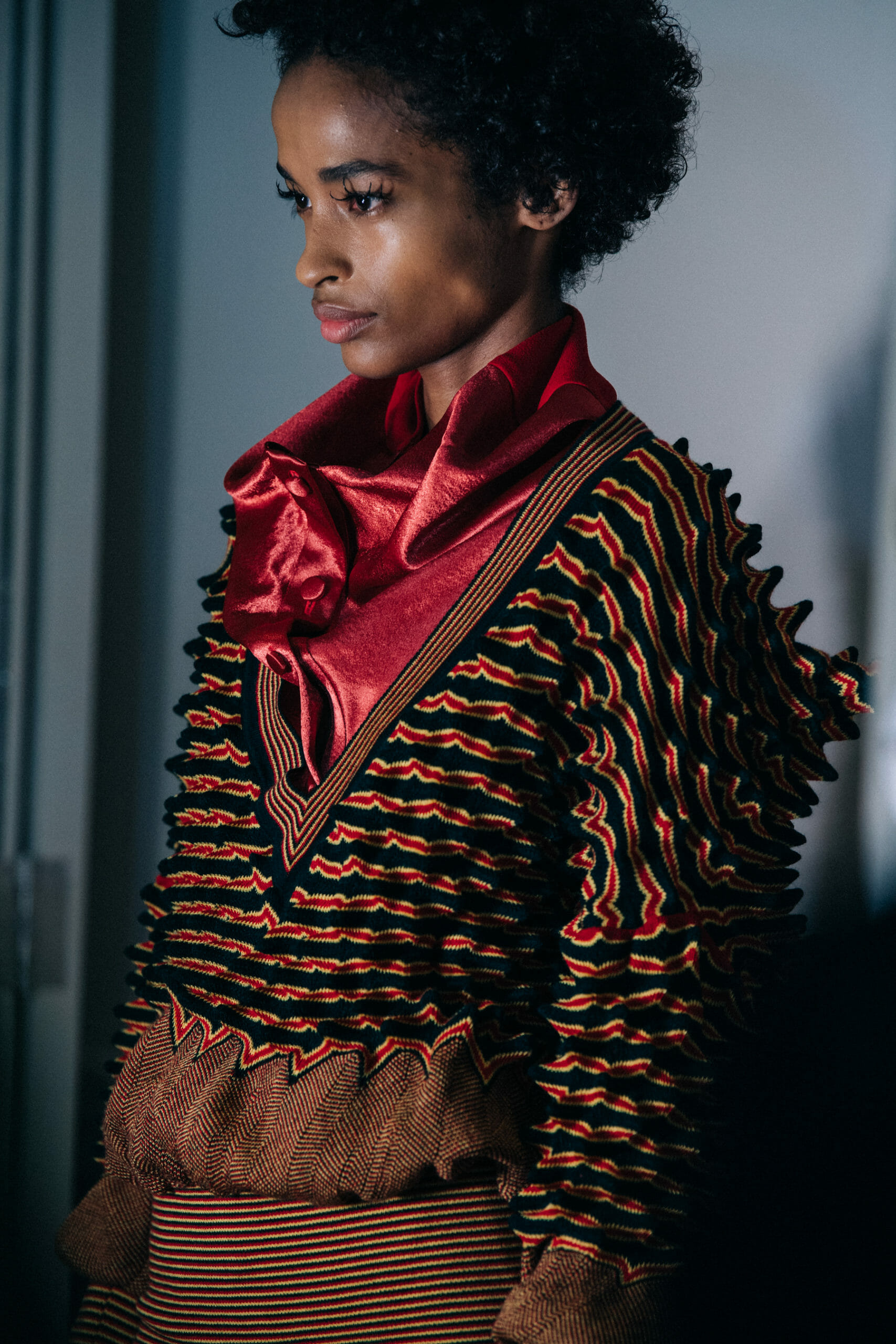 Models wearing colourful Kiko Kostadinov outfits