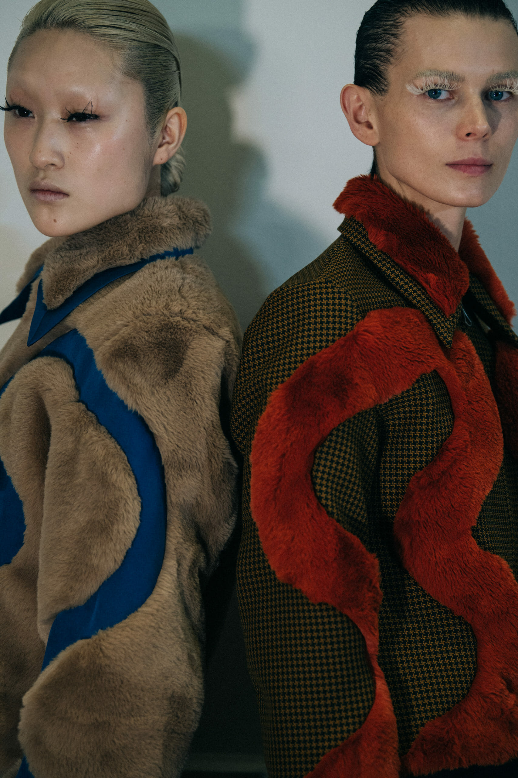 Models wearing furry jackets