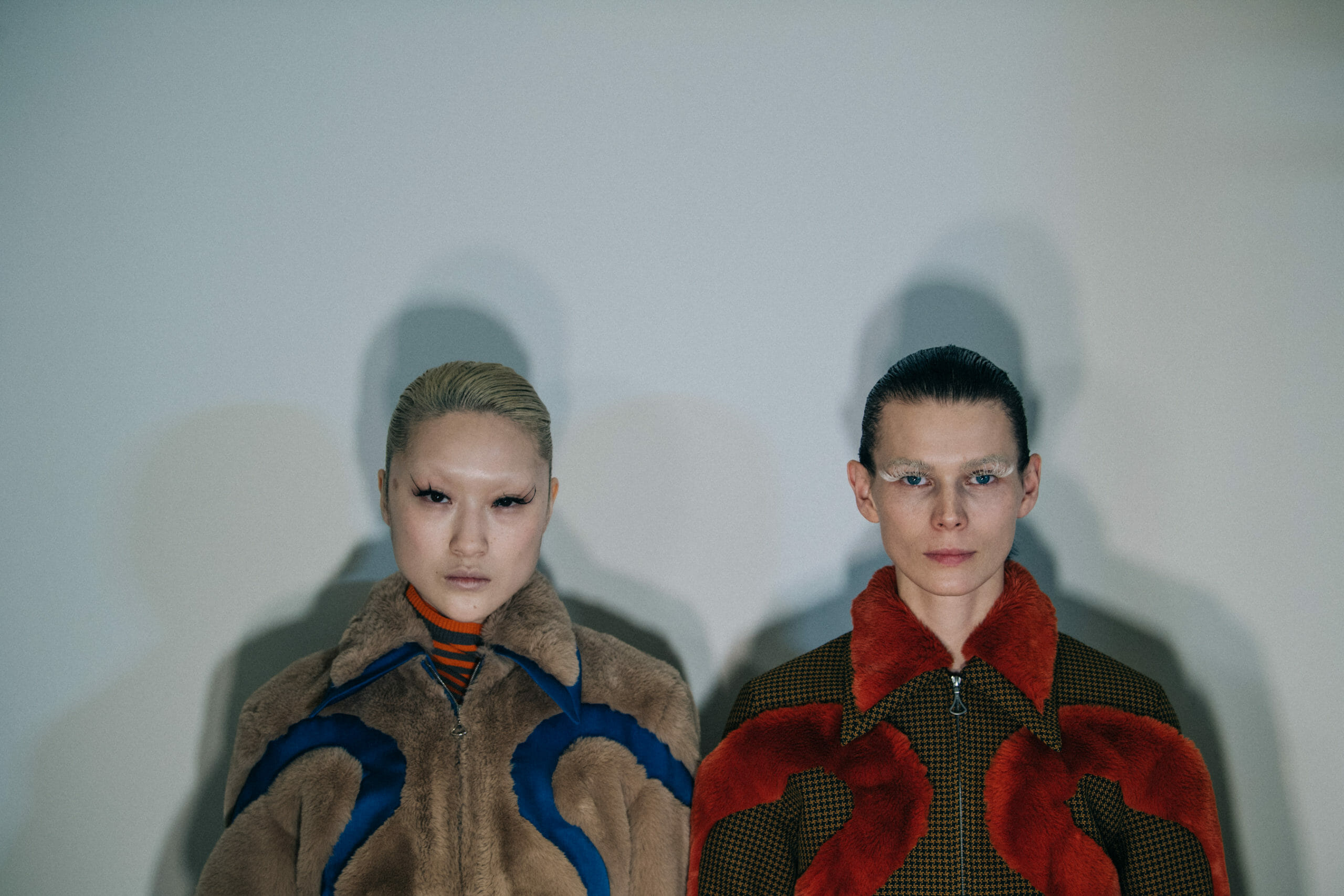 Models wearing furry jackets