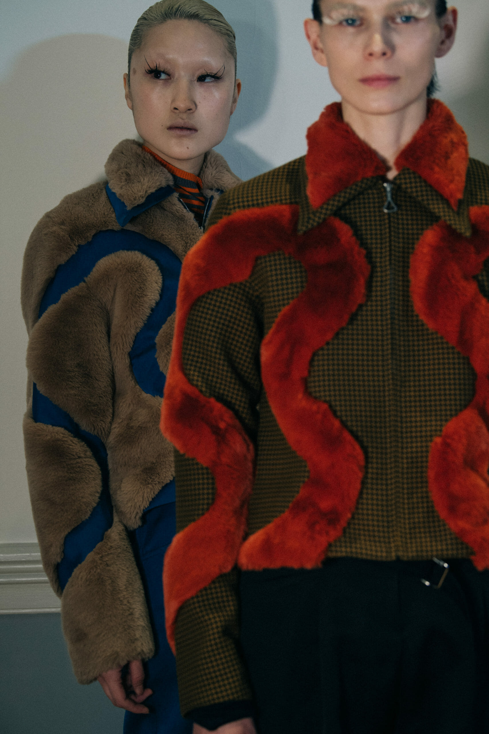 Models wearing furry jackets