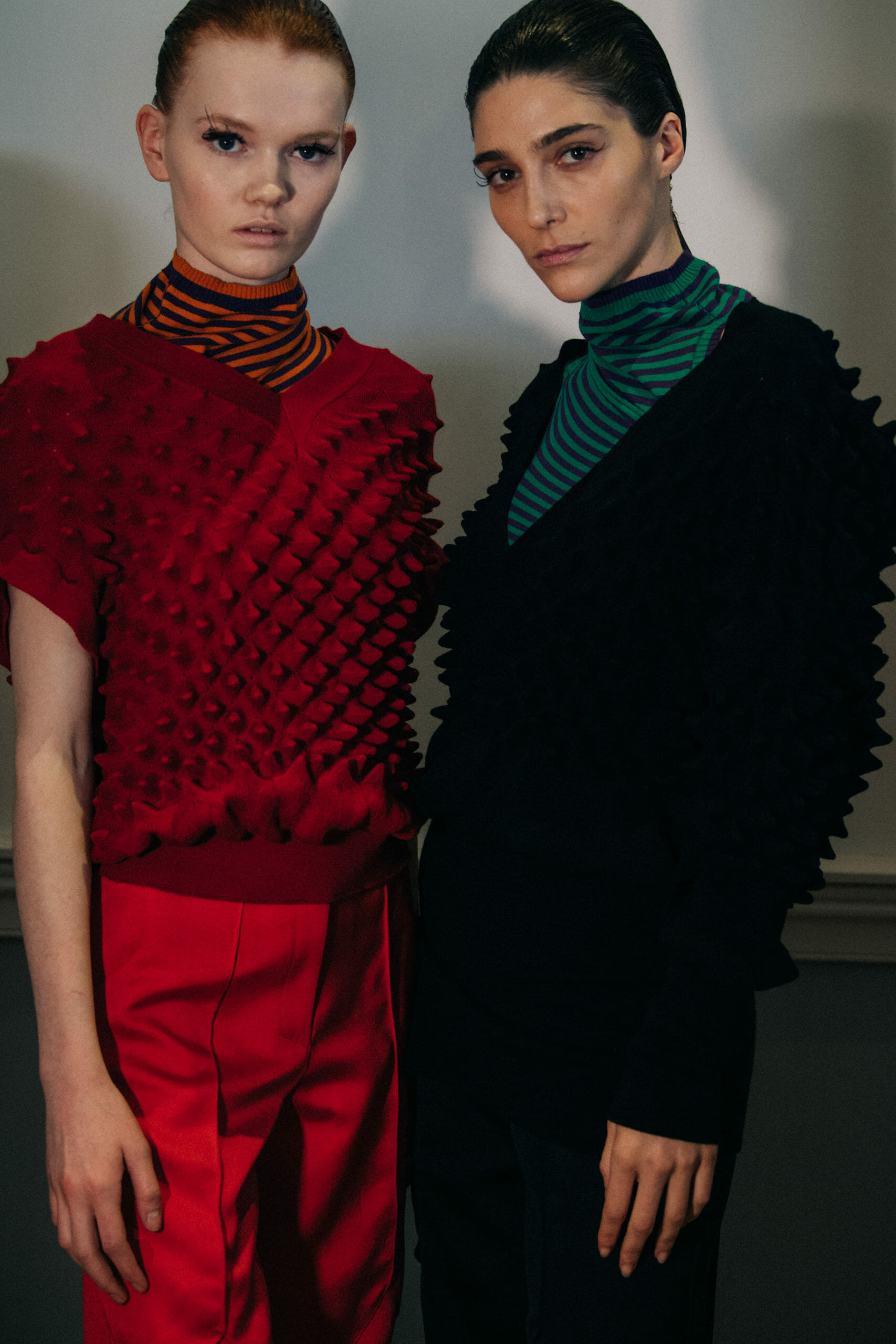 Models wearing colourful Kiko Kostadinov outfits