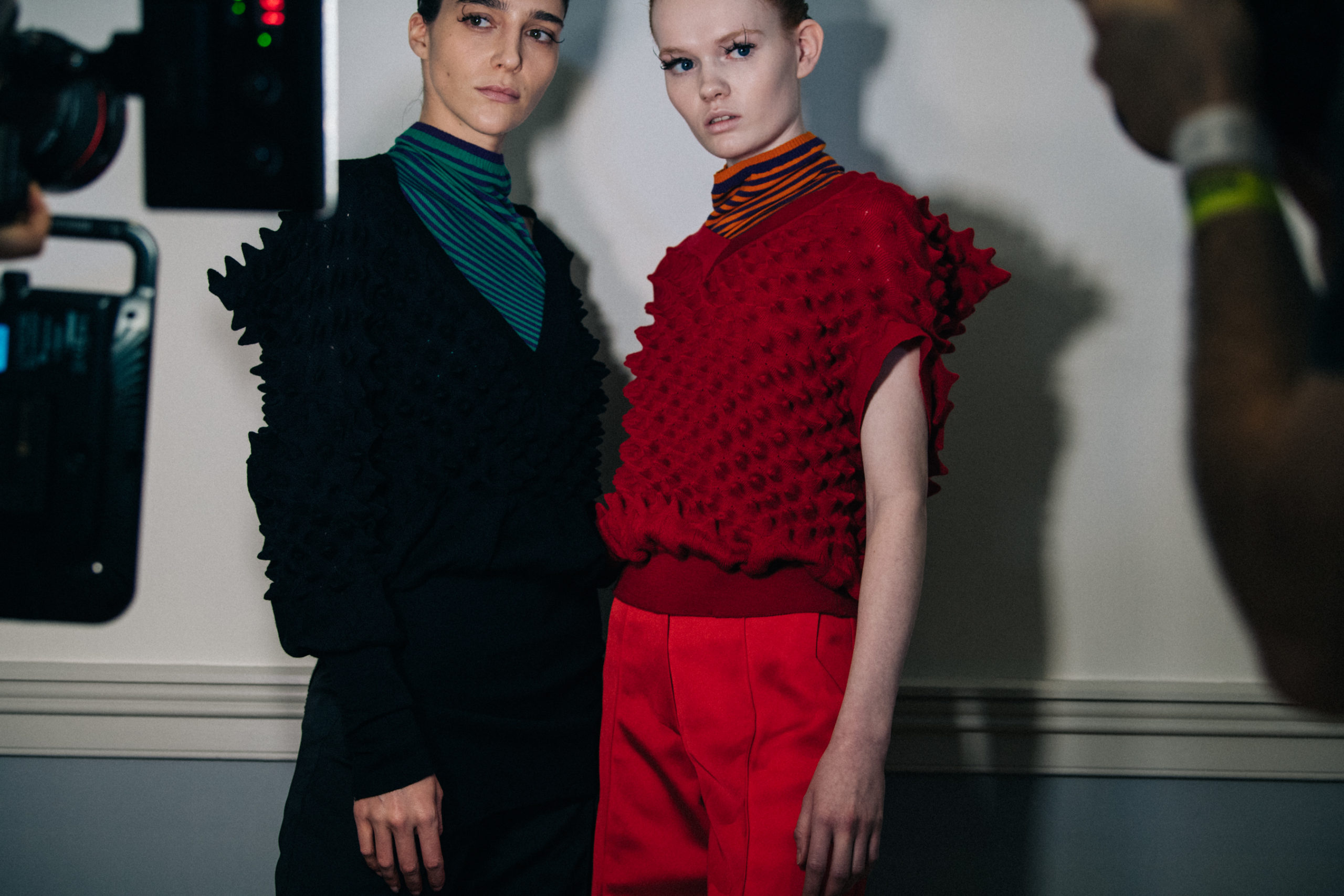 Models wearing colourful Kiko Kostadinov outfits