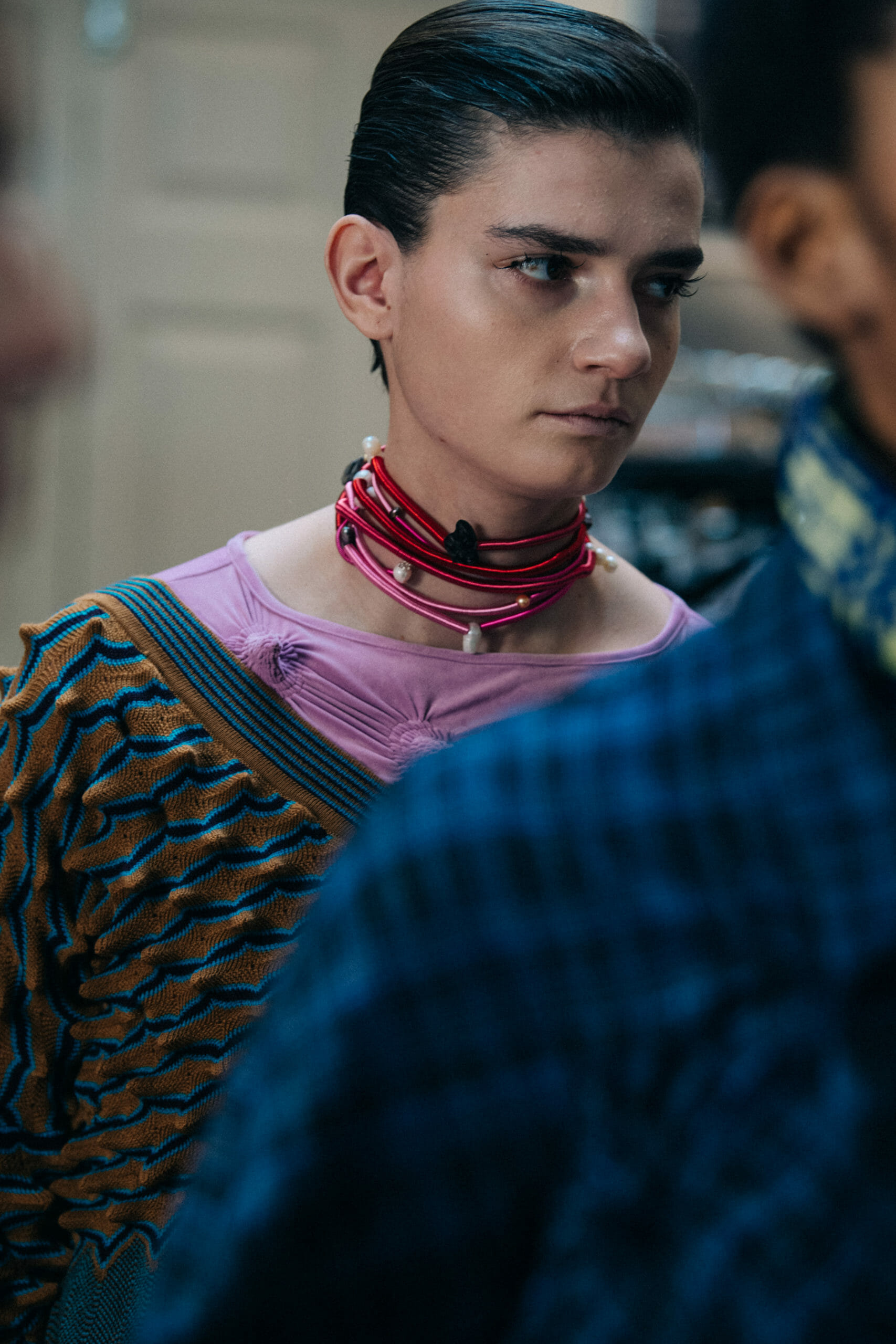 Models wearing colourful Kiko Kostadinov outfits