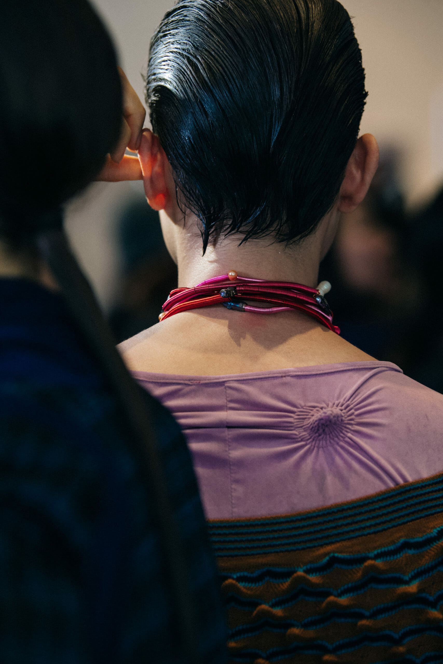 Models wearing colourful Kiko Kostadinov outfits