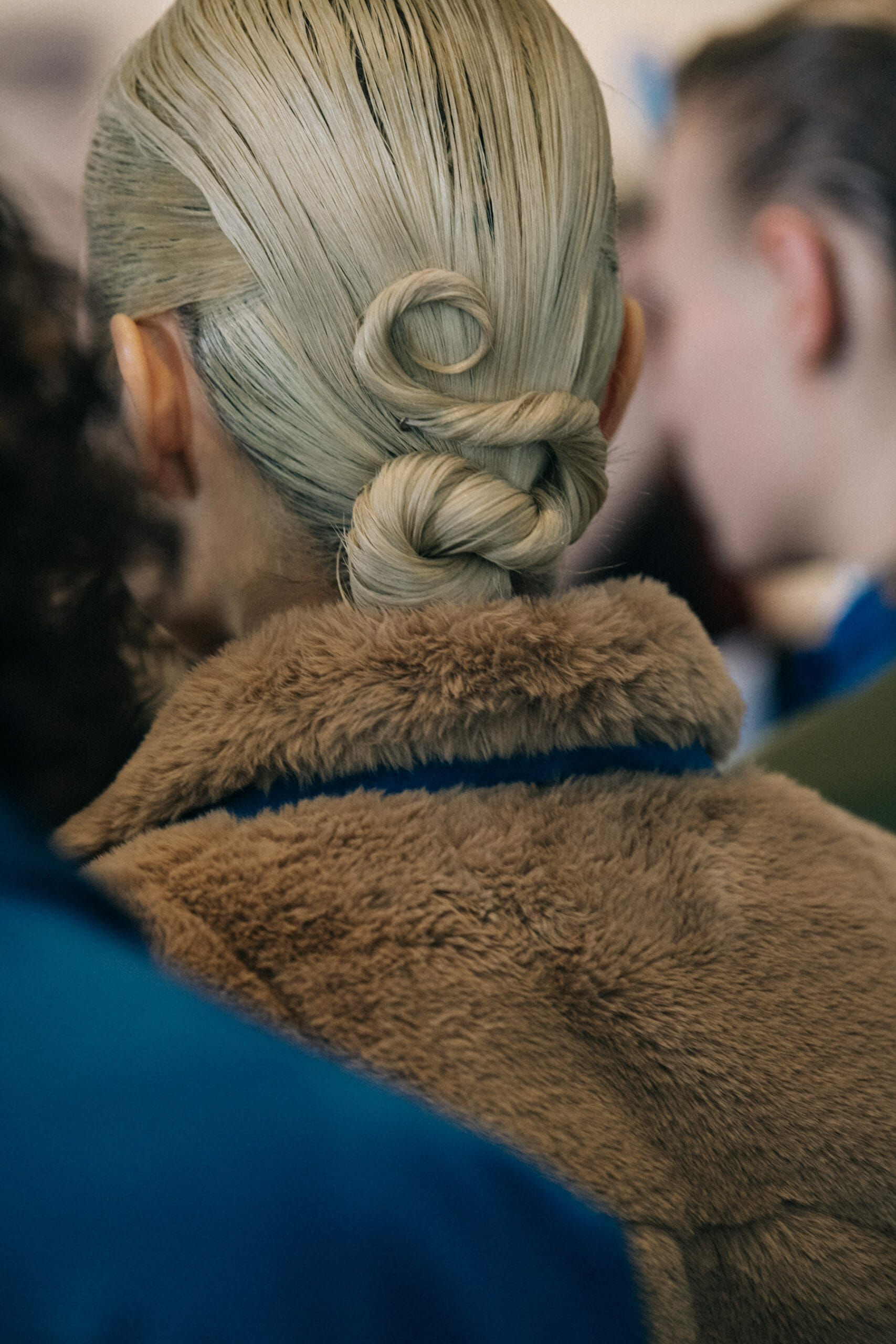 Models wearing furry jackets