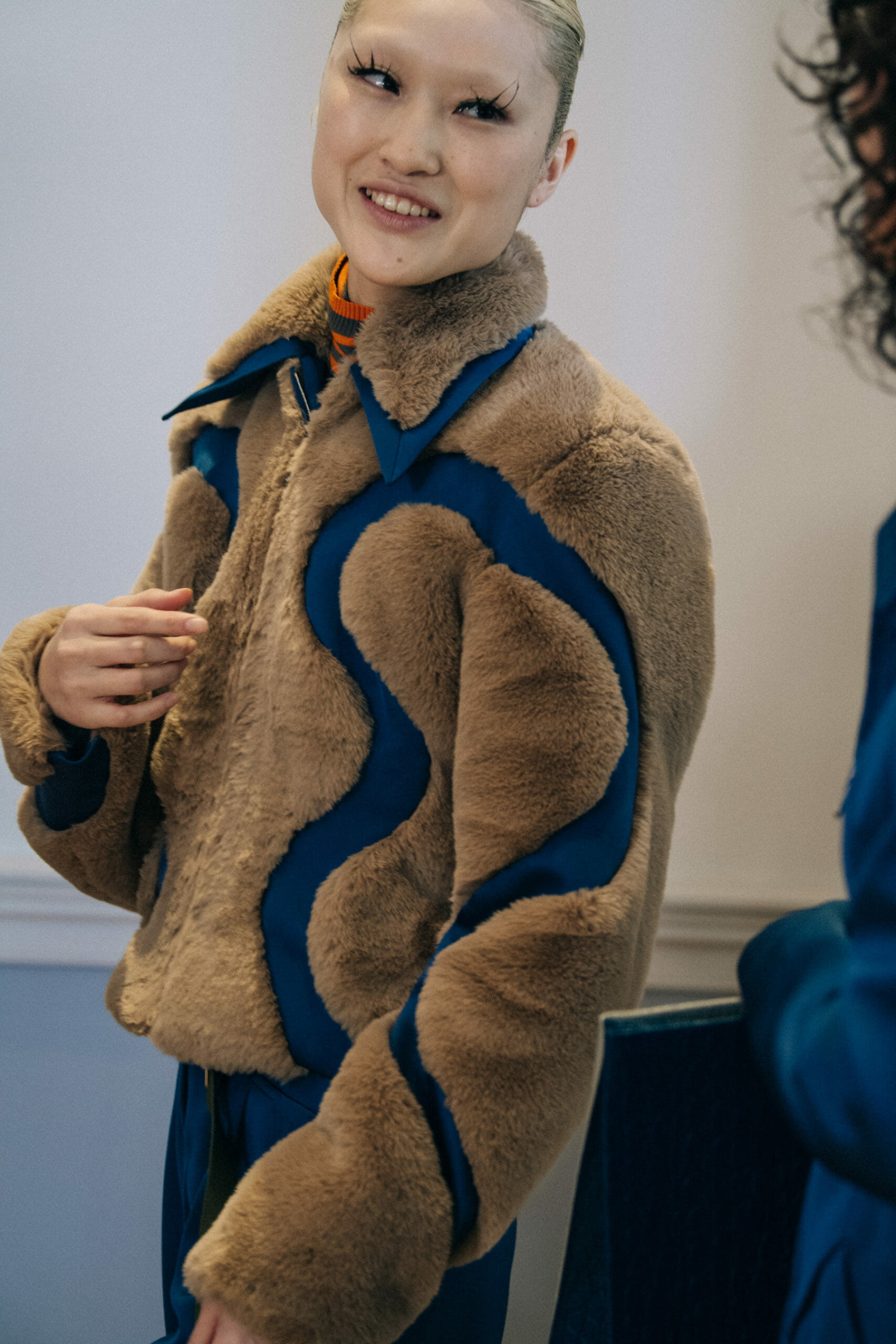 Models wearing furry jackets