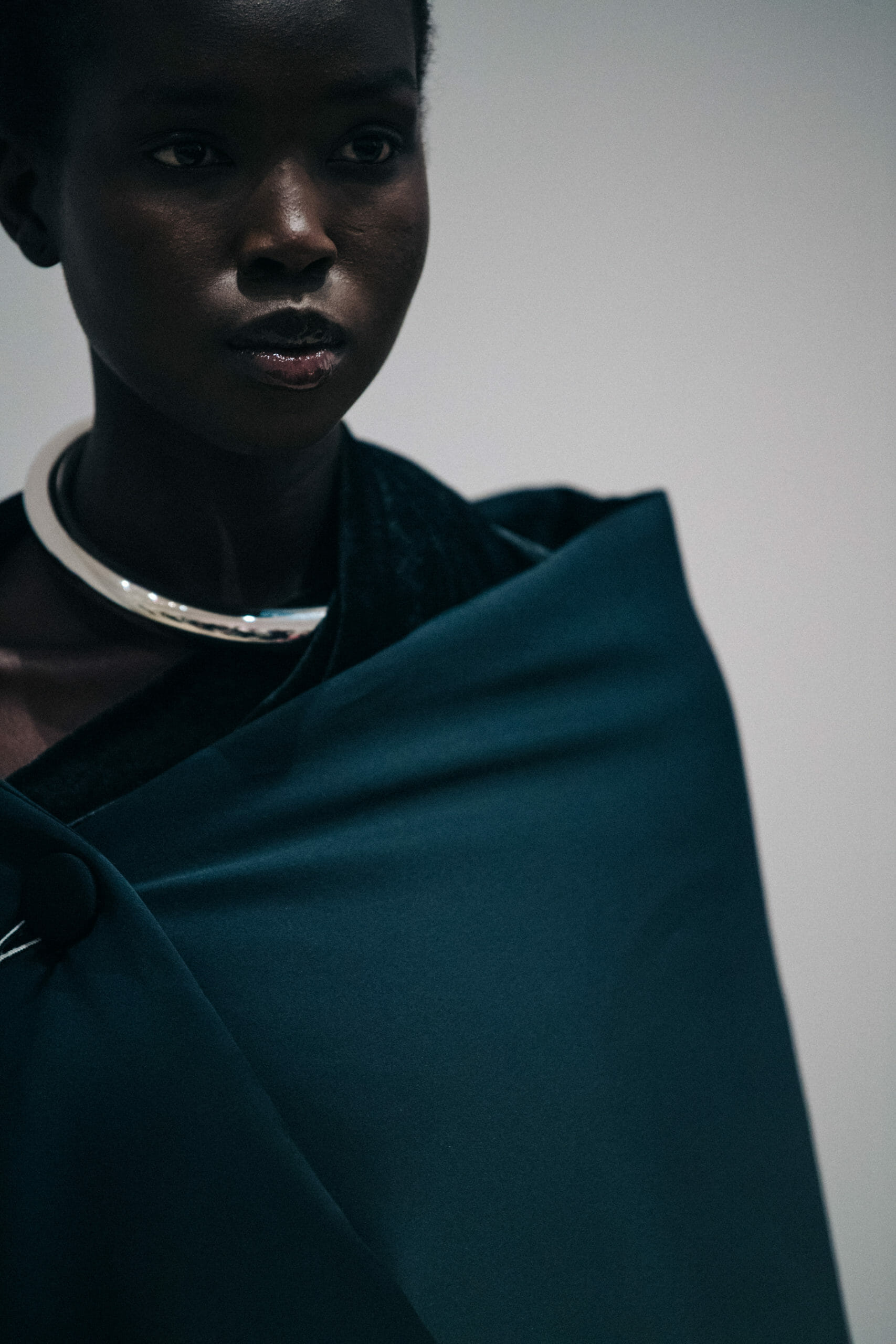 Model wearing black Proenza Schouler dress