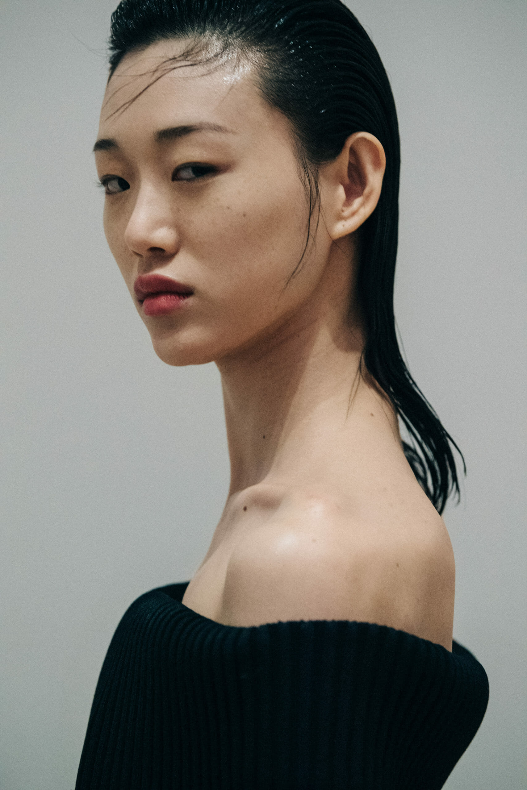 Model wearing black Proenza Schouler dress