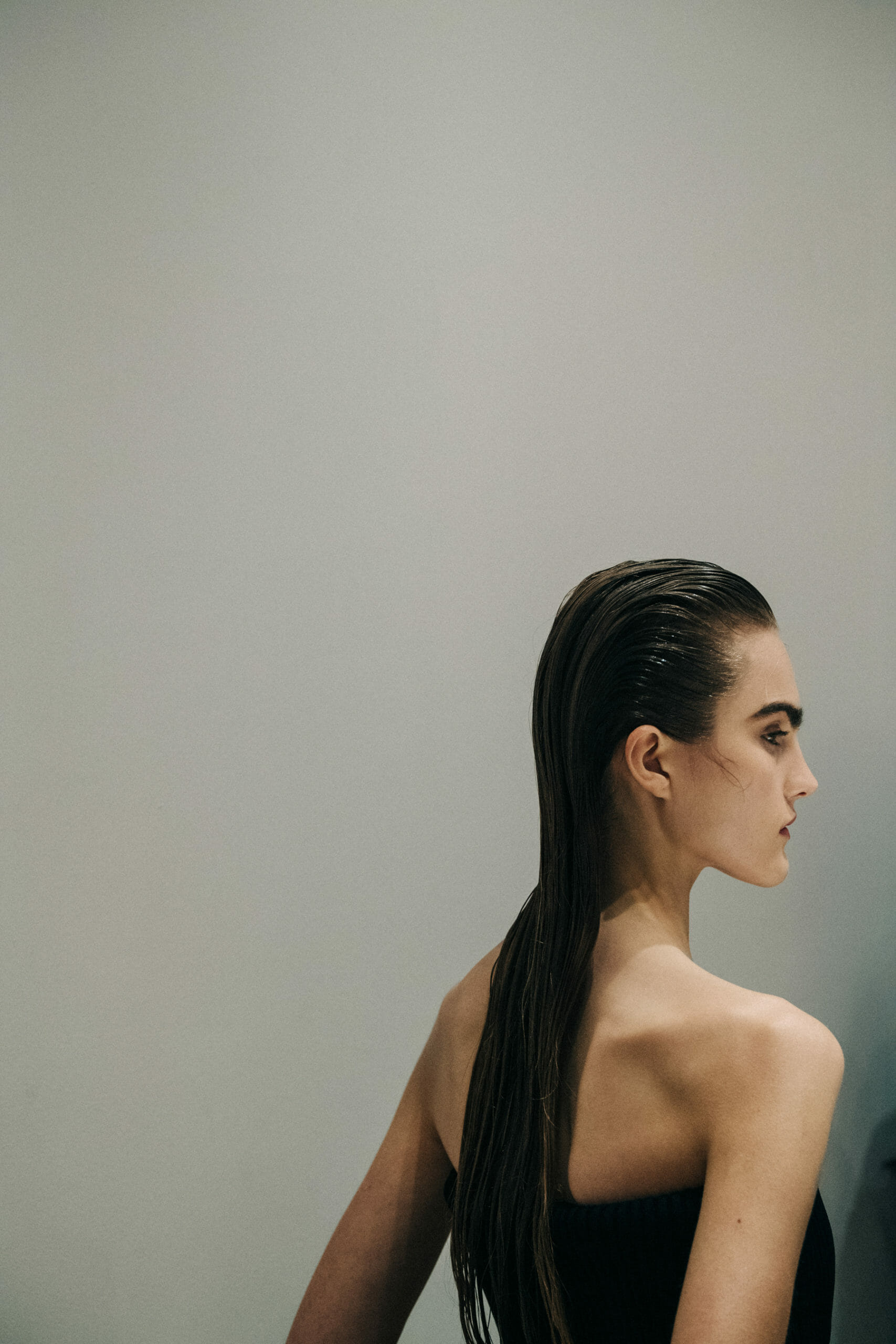 Model wearing black Proenza Schouler dress