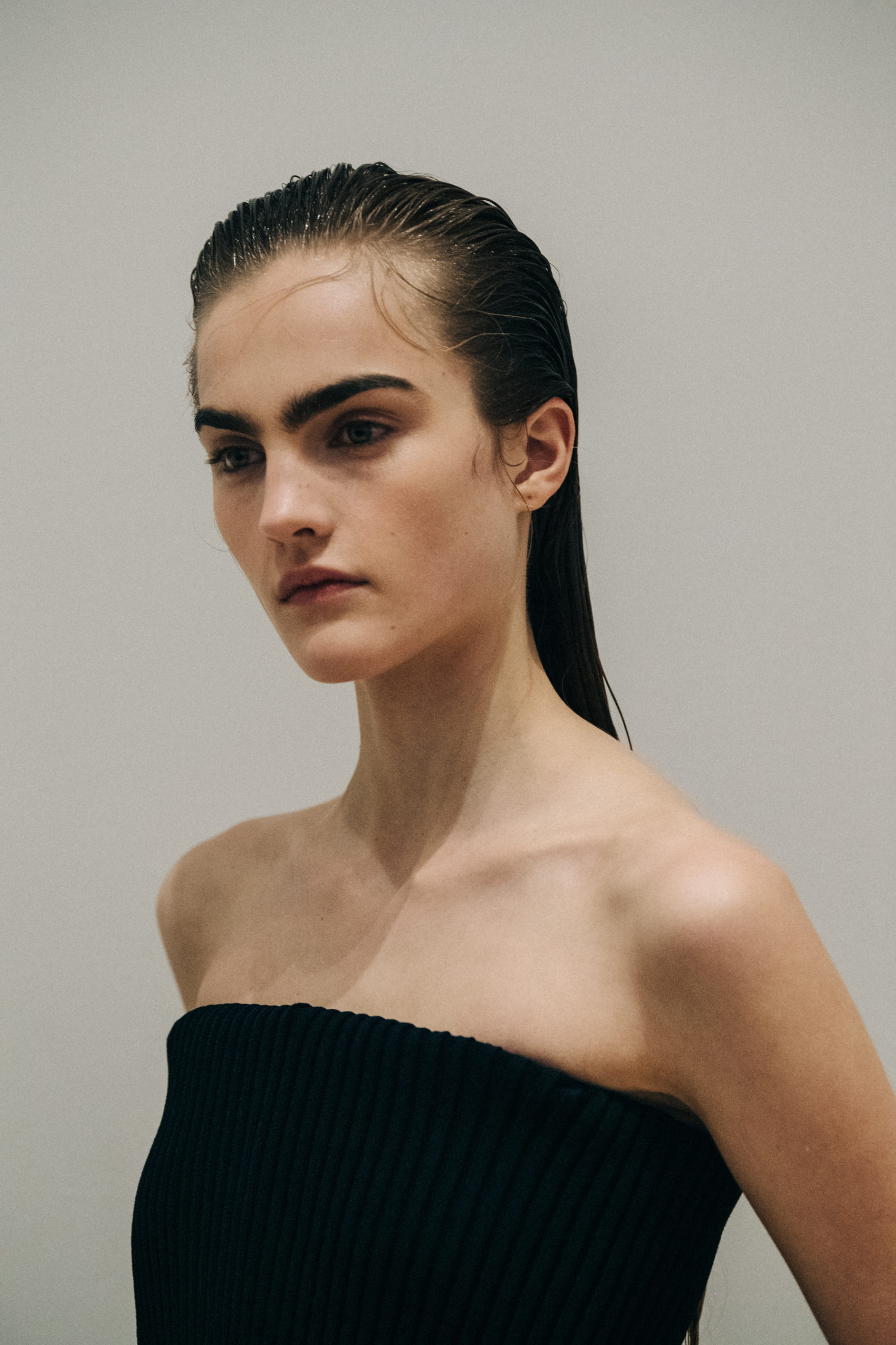 Model wearing black Proenza Schouler dress