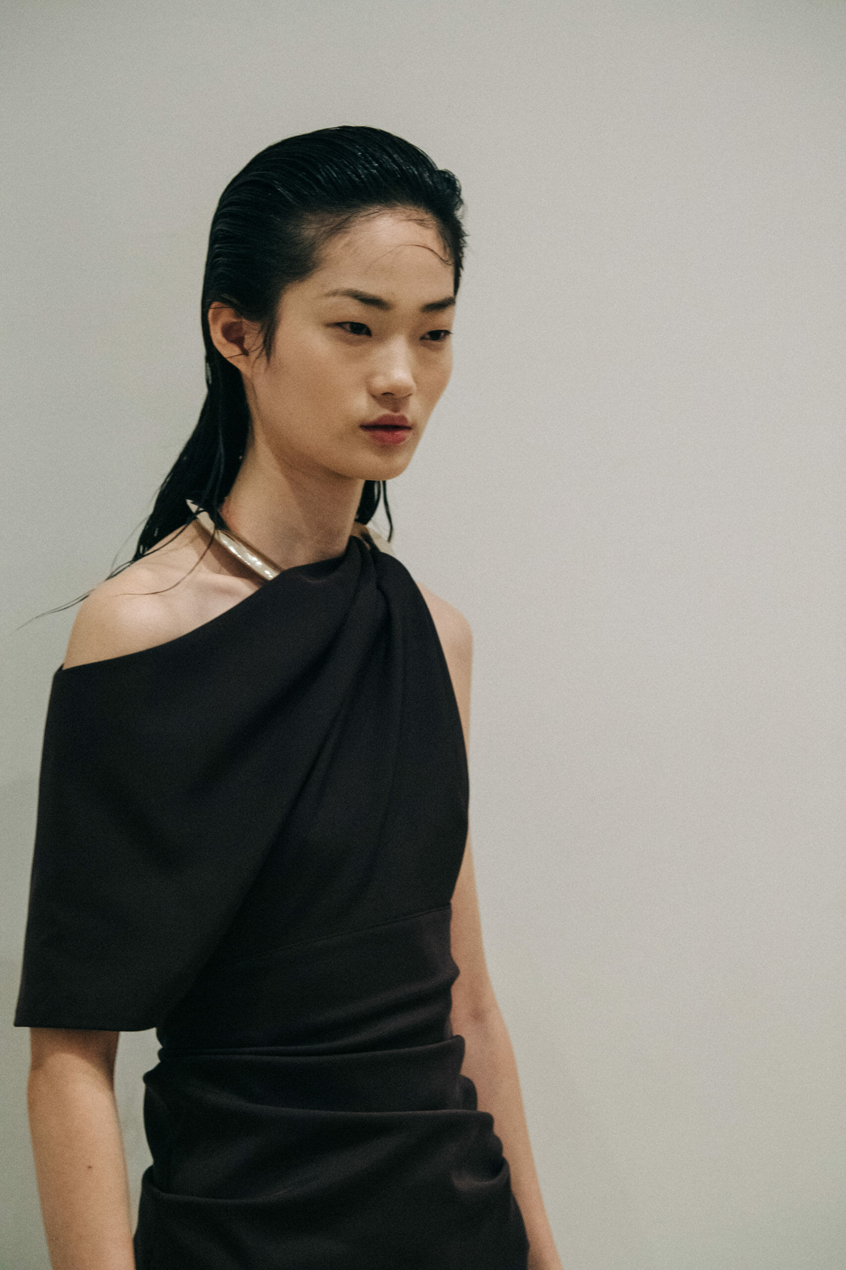 Model wearing black Proenza Schouler dress
