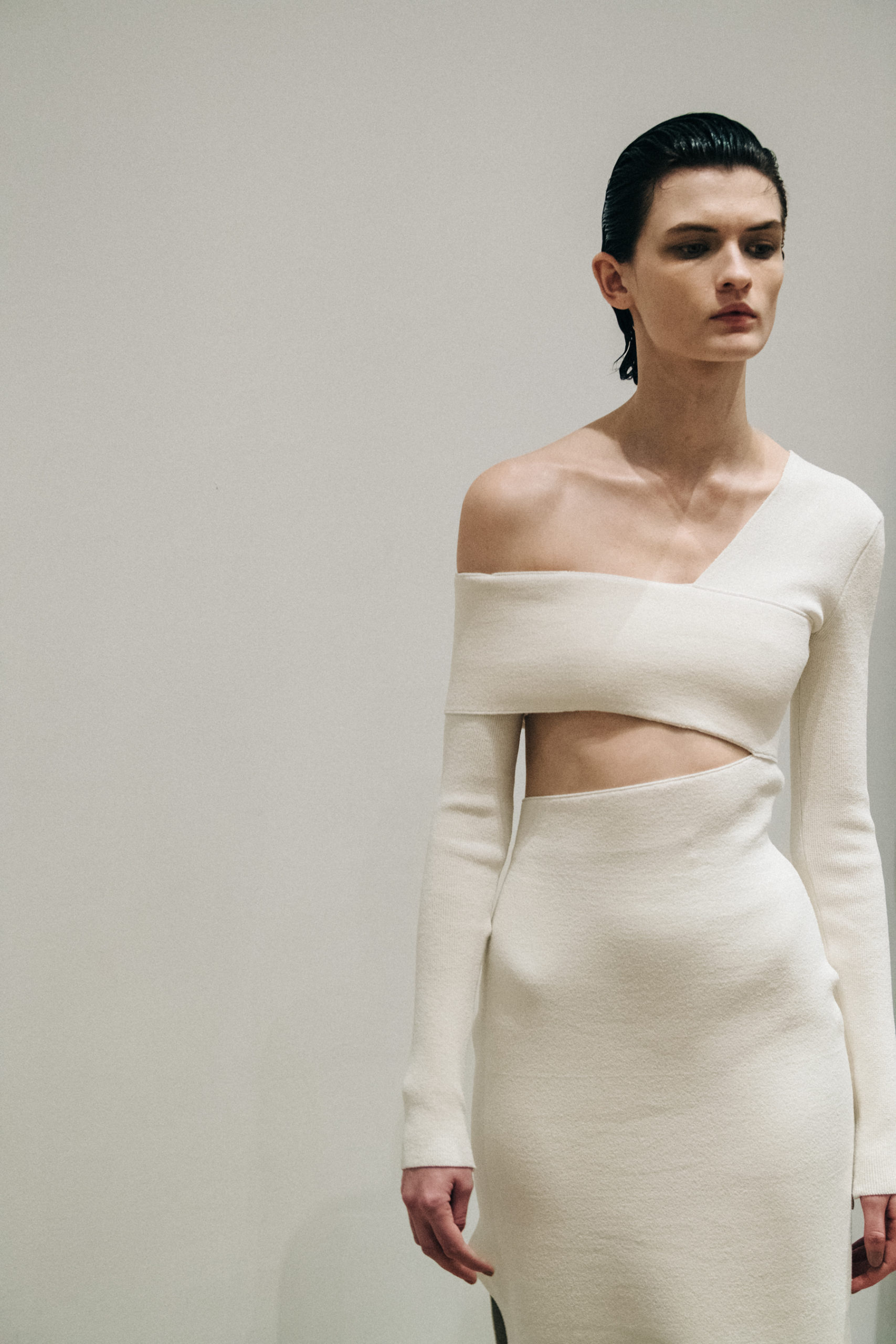 Model wearing white Proenza Schouler dress
