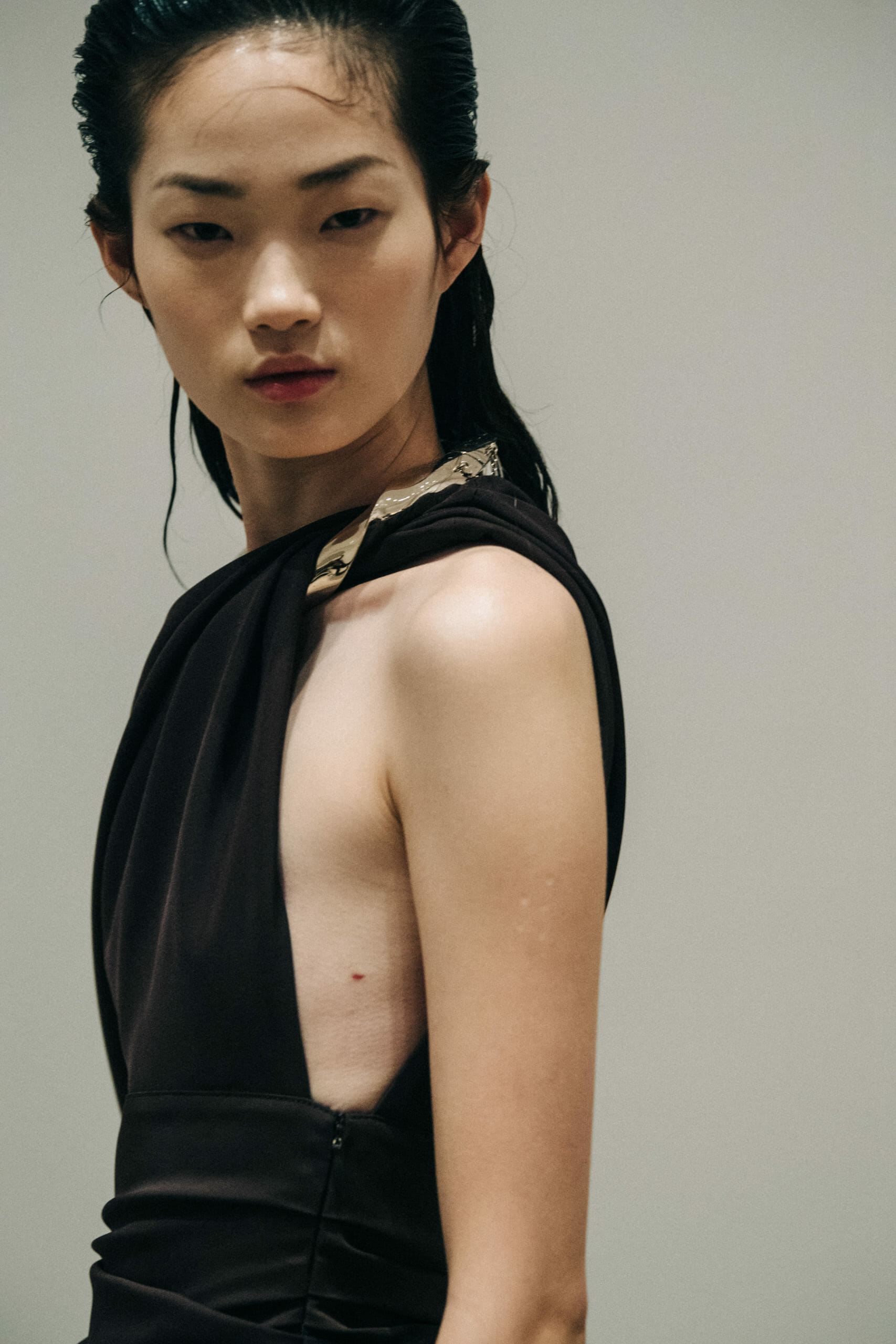 Model wearing black Proenza Schouler dress