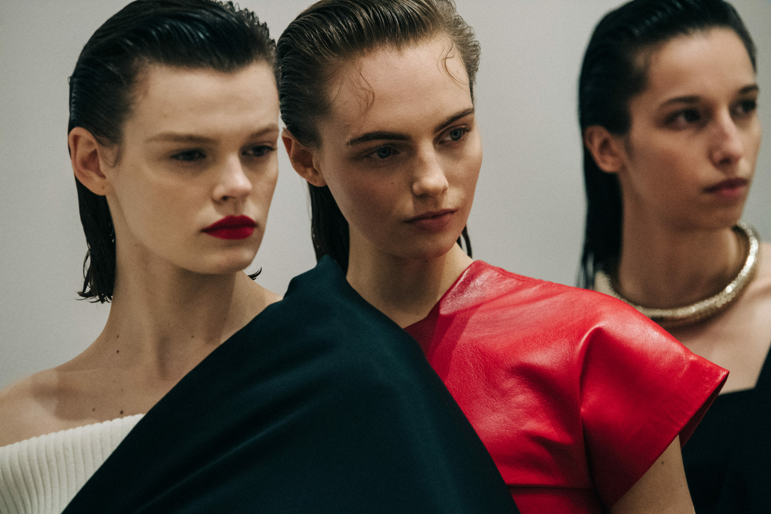 Model wearing red Proenza Schouler dress