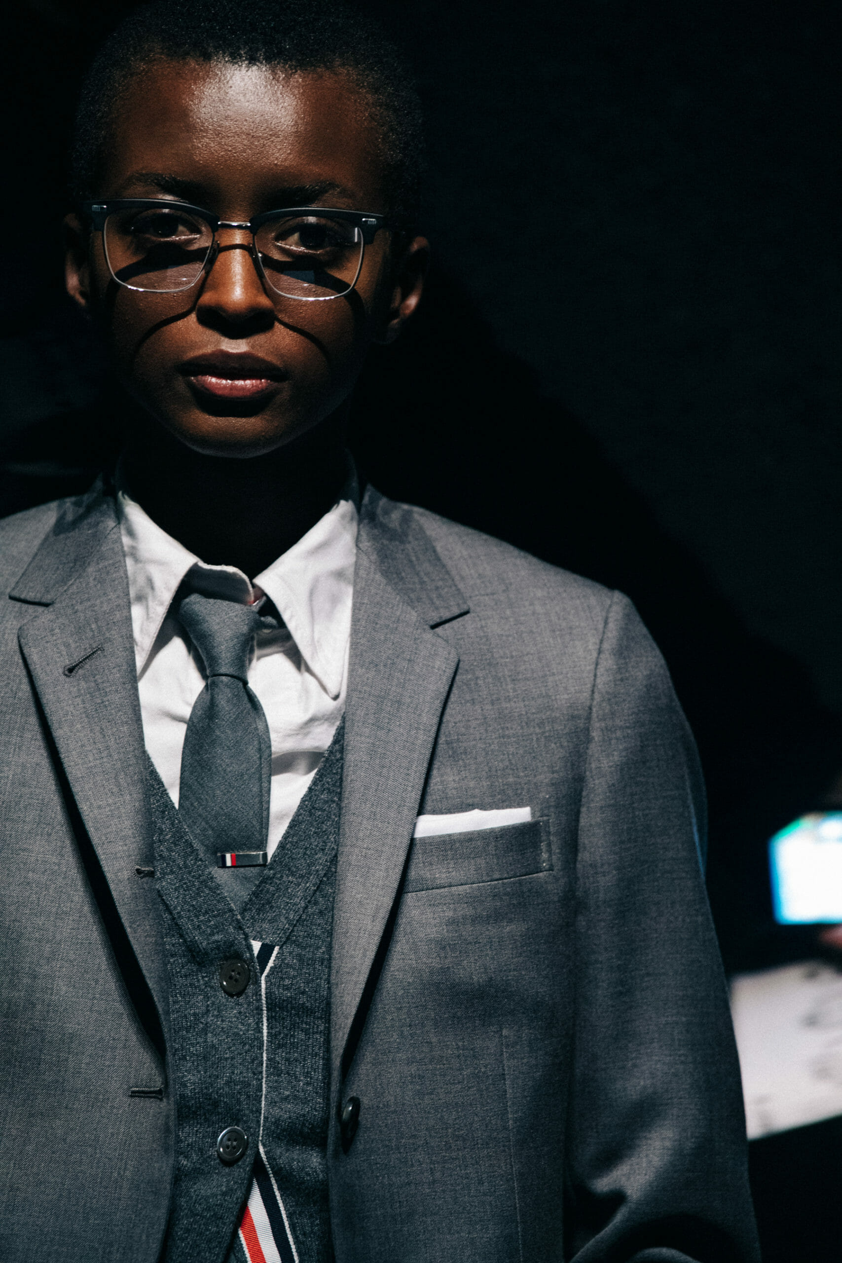Models wearing Thom Browne suit