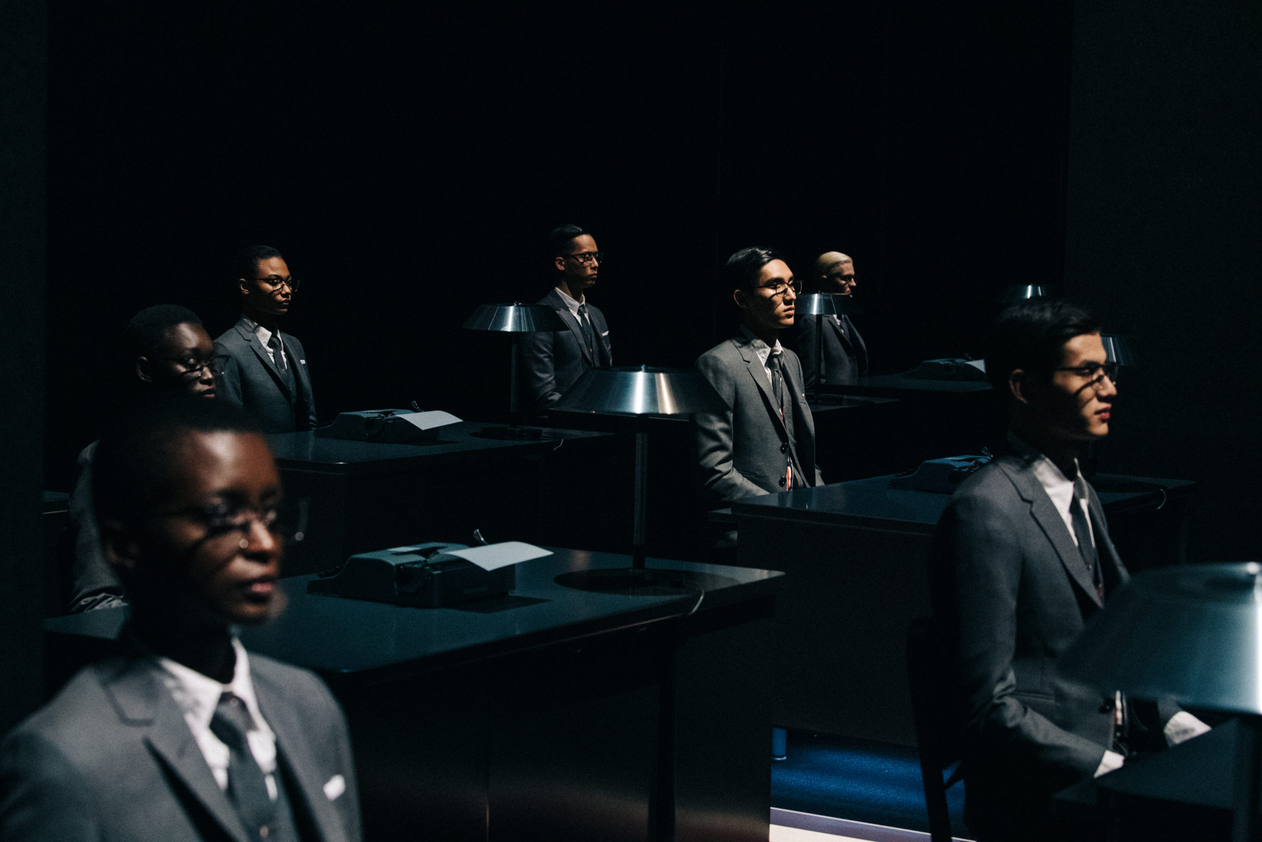 Models wearing Thom Browne suit