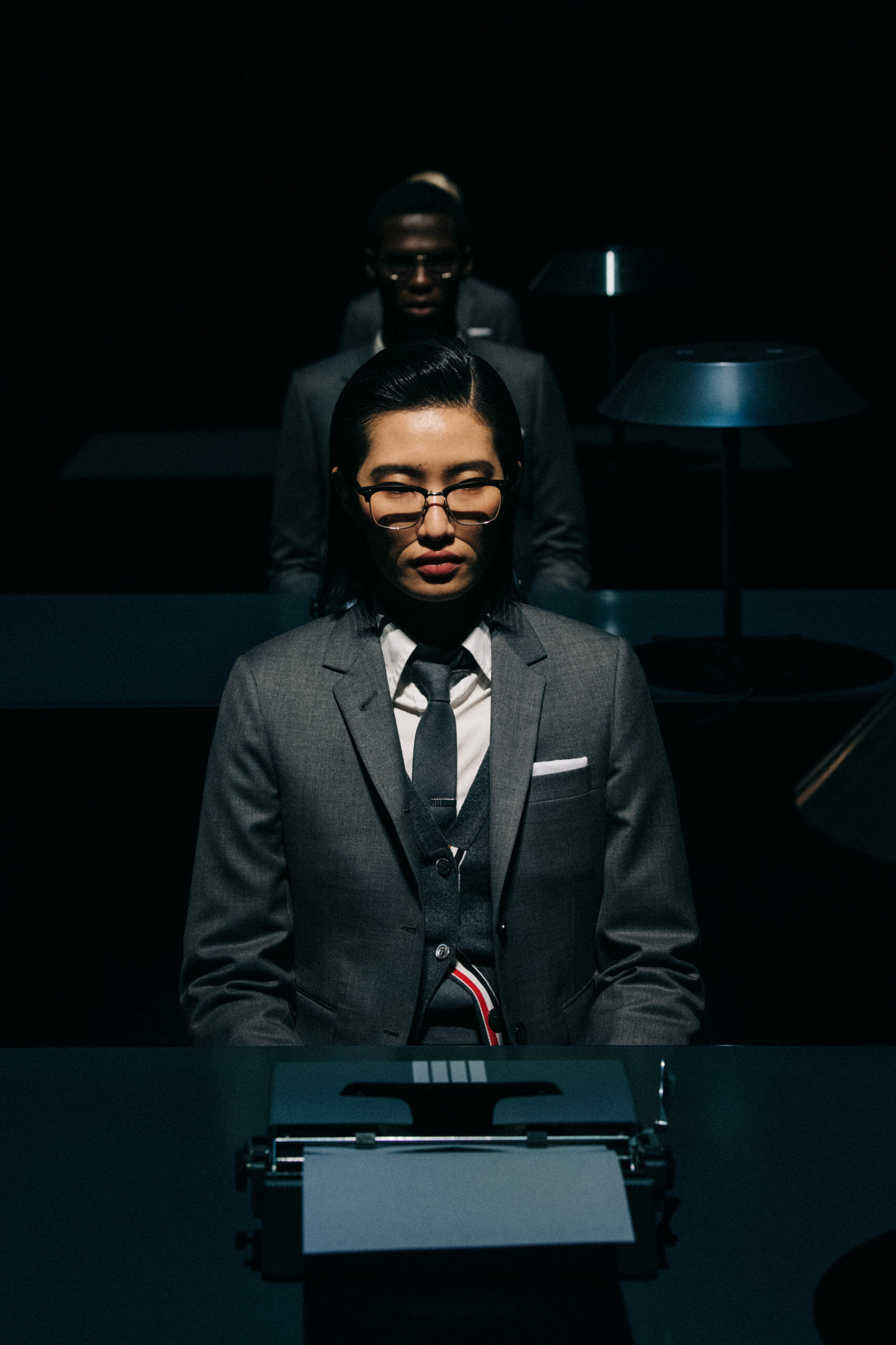 Models wearing Thom Browne suit