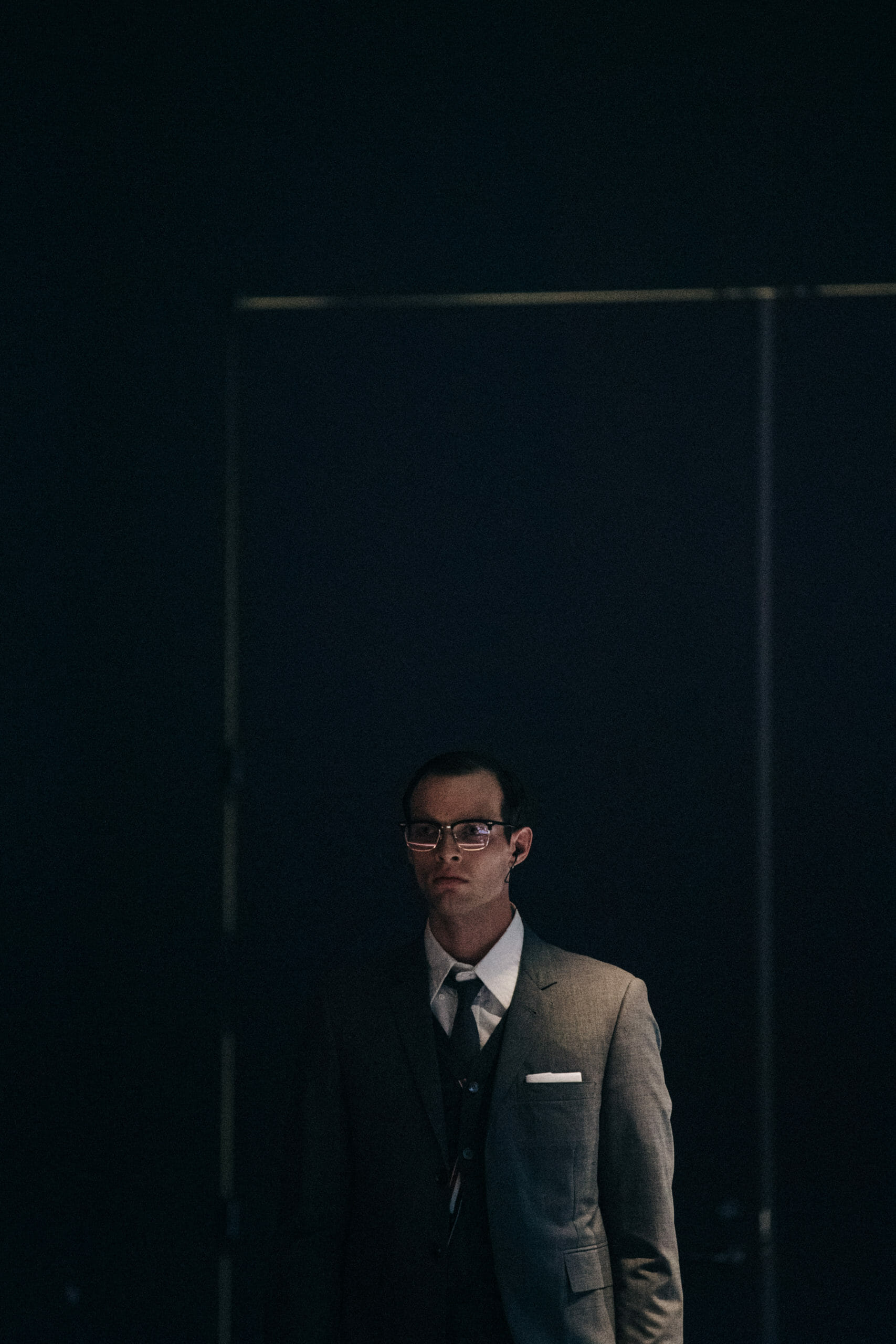 Models wearing Thom Browne suit